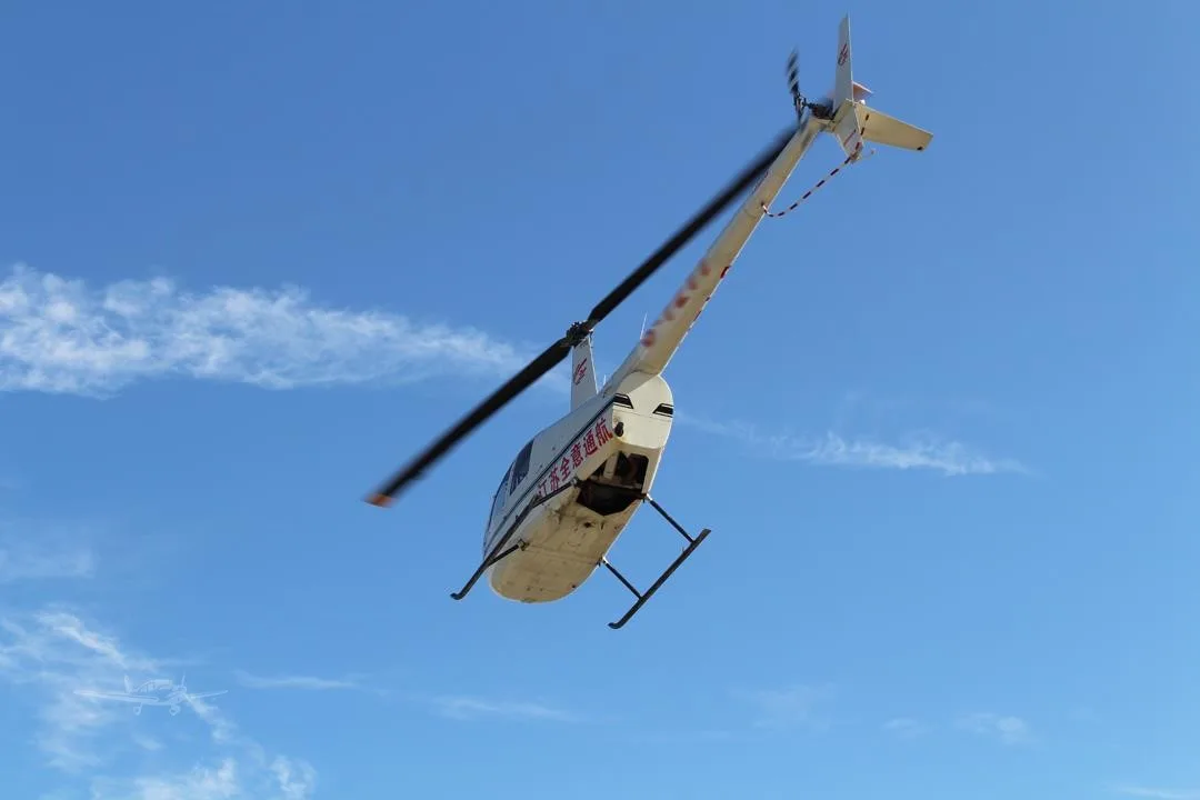 Marketing image of a 2015 ROBINSON R44 RAVEN II.