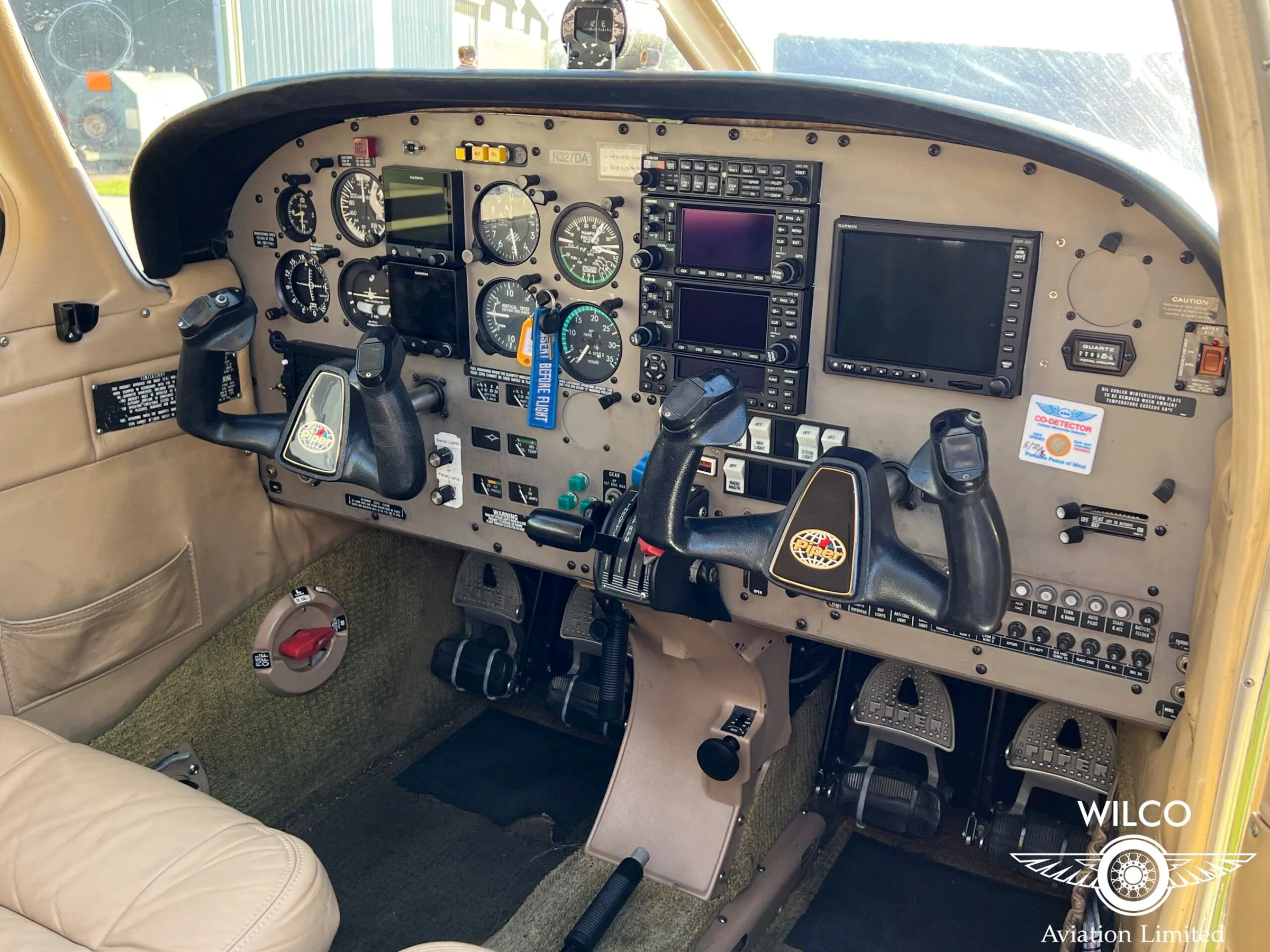 Cockpit and instrument panel of a 2002 Piper PA-28R-201 Arrow III.