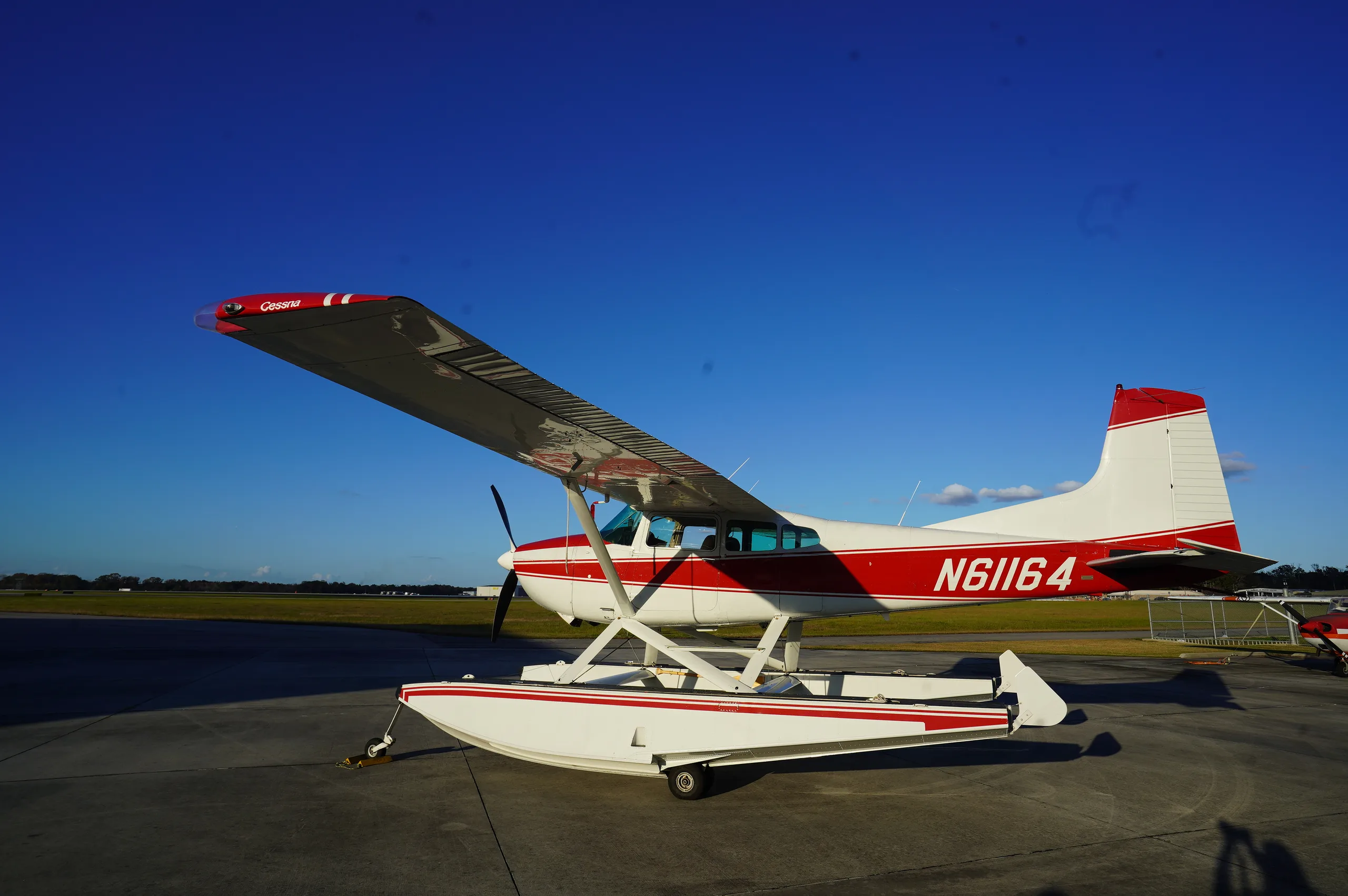Exterior view of a 1980 Cessna A185F Amphibian, N61164.