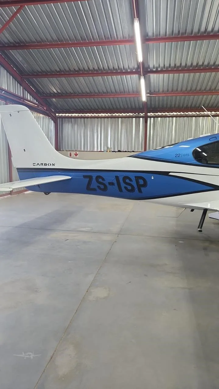 Exterior view of a 2017 CIRRUS SR22-G6, ZS-ISP.