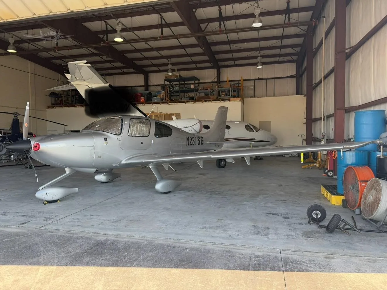 Exterior view of a 2015 CIRRUS SR20-G3, N231SG.