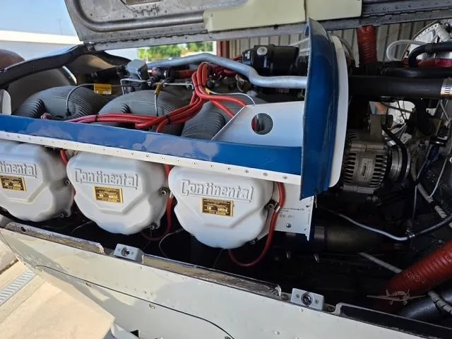 Engine detail of a 1958 BEECHCRAFT J35 BONANZA.