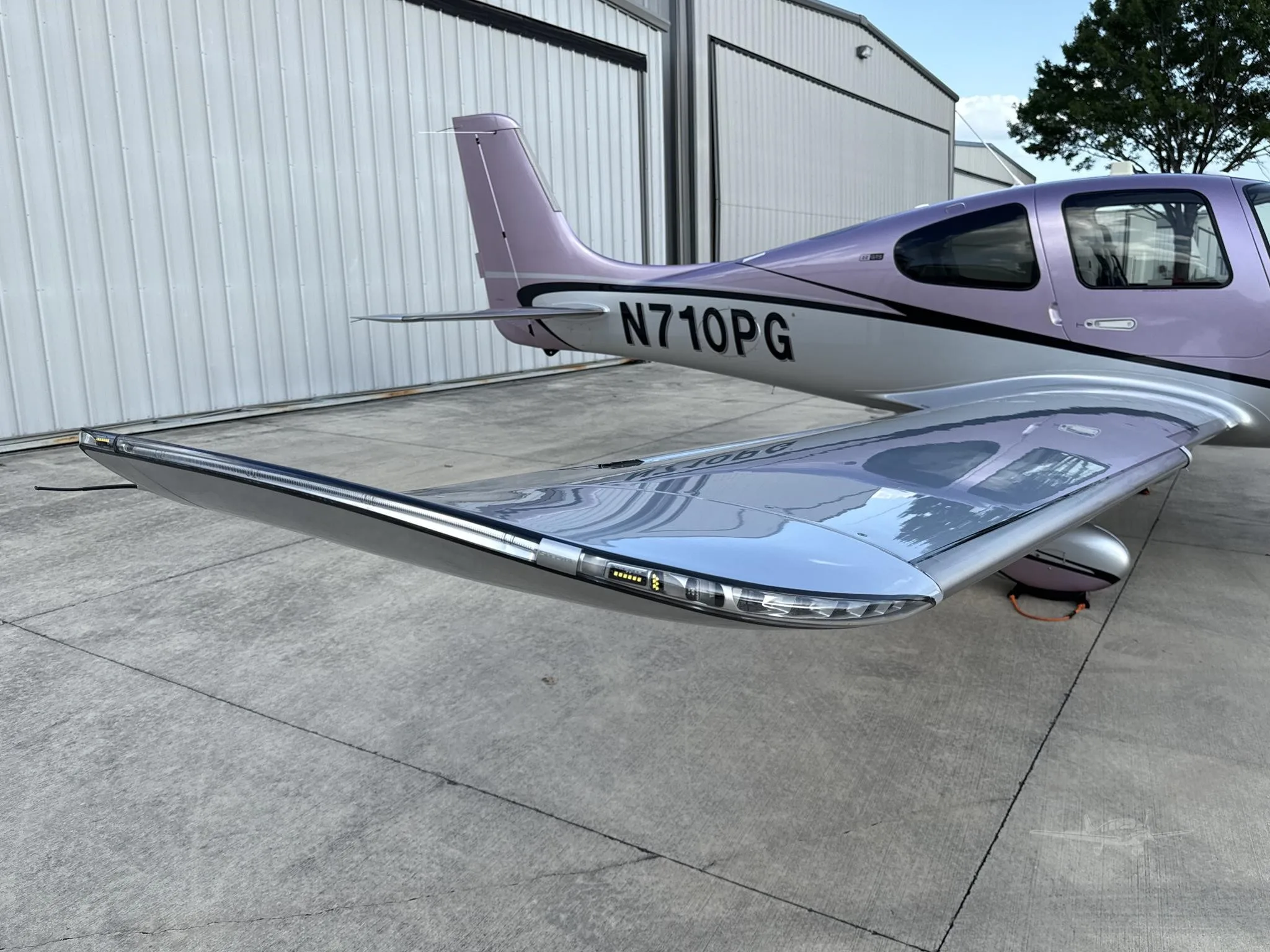 Exterior view of a 2024 CIRRUS SR22-G7, N710PG.