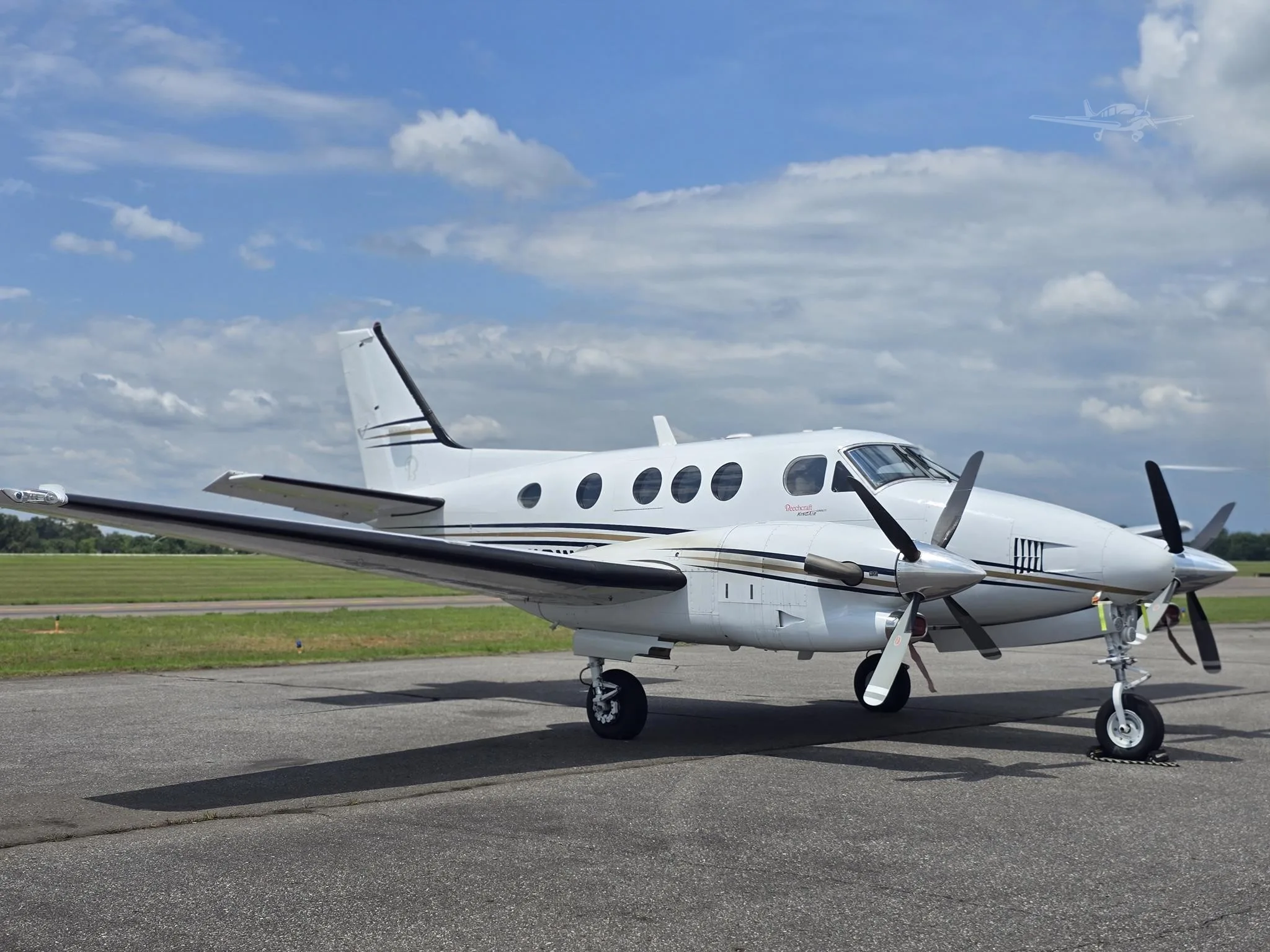 Exterior view of a 2008 BEECHCRAFT KING AIR C90GTI, N12WE.