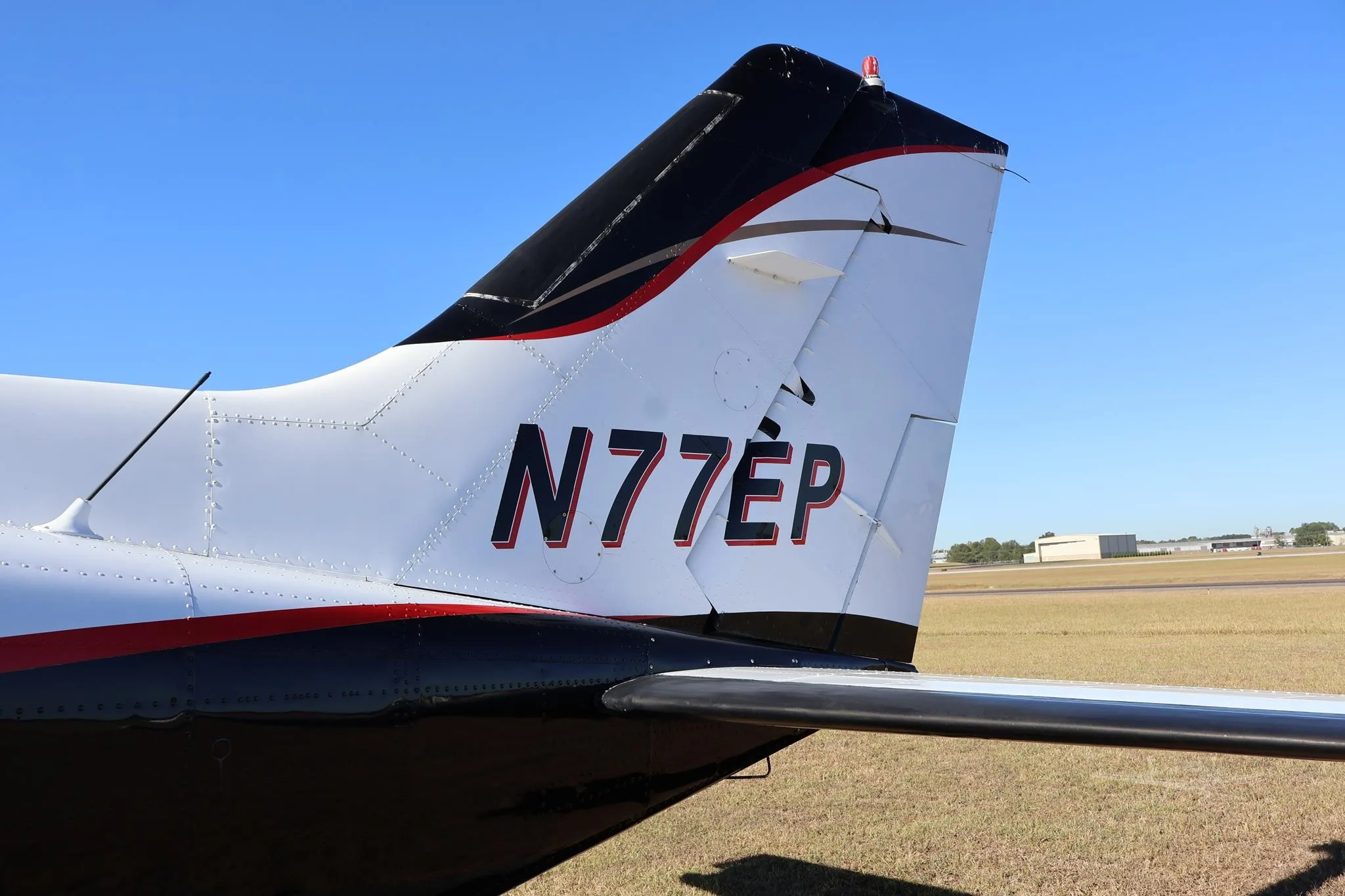 Exterior view of a 1973 CESSNA 421B, N77EP.