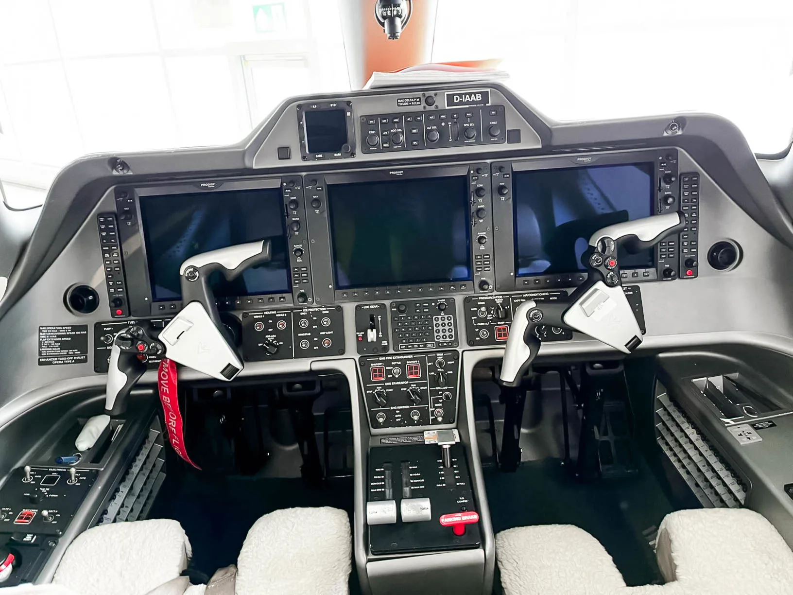 Cockpit and instrument panel of a 2010 Embraer Phenom 100.