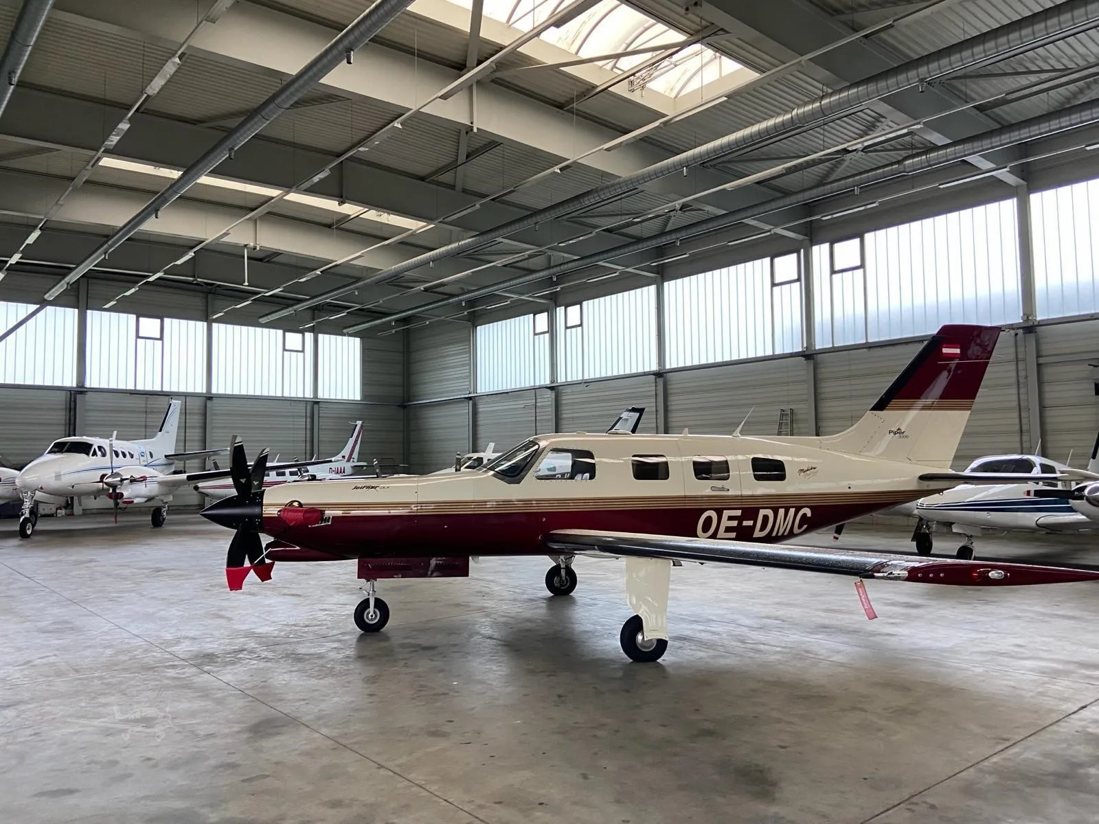 Exterior view of a 2000 PIPER JETPROP, OE-DMC.