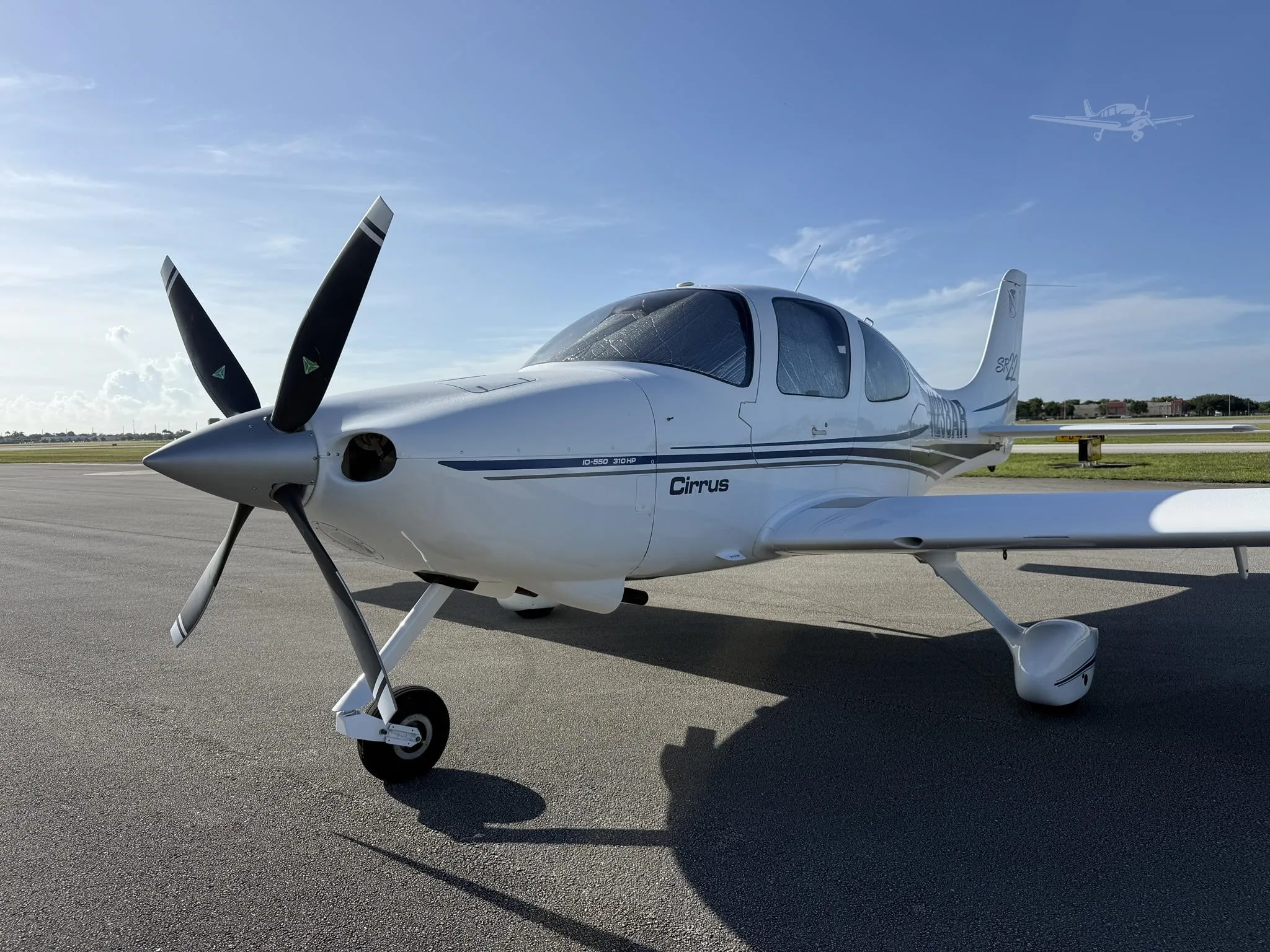 Exterior view of a 2002 CIRRUS SR22, N238AR.