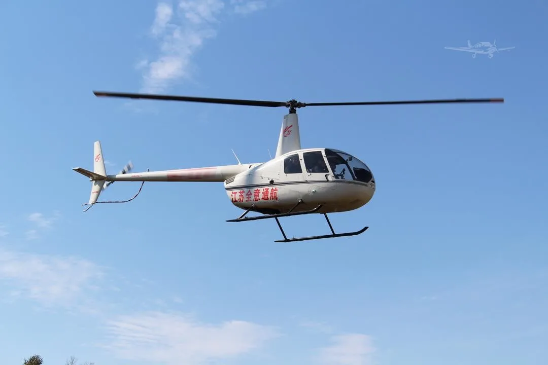 Marketing image of a 2015 ROBINSON R44 RAVEN II.