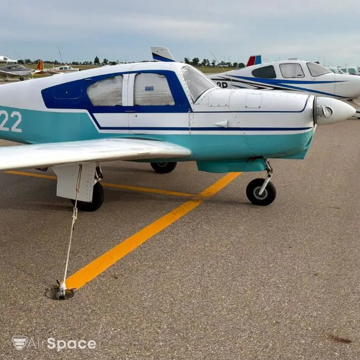 Exterior view of a 1961 Mooney M20B Mark 21.