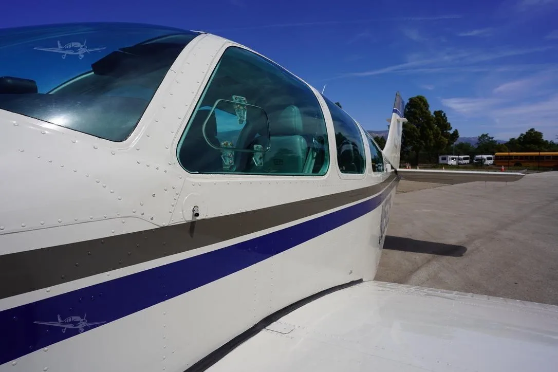 Exterior view of a 1989 BEECHCRAFT F33A BONANZA, N1562B.