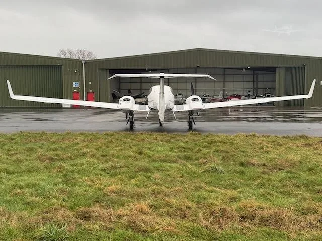 Exterior view of a 2008 DIAMOND DA42 TDI, N618KM.