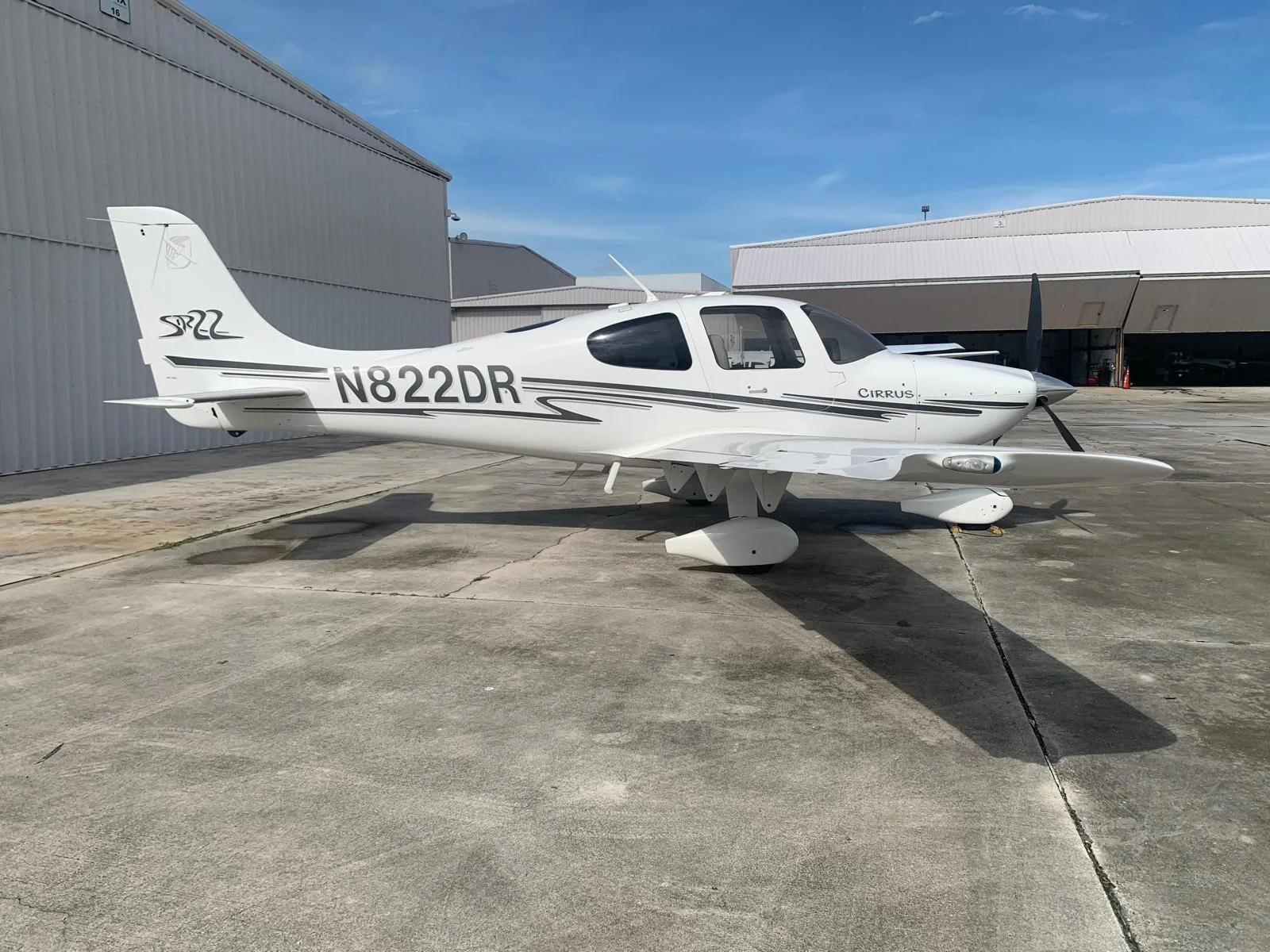 Exterior view of a 2003 CIRRUS SR22, N822DR.
