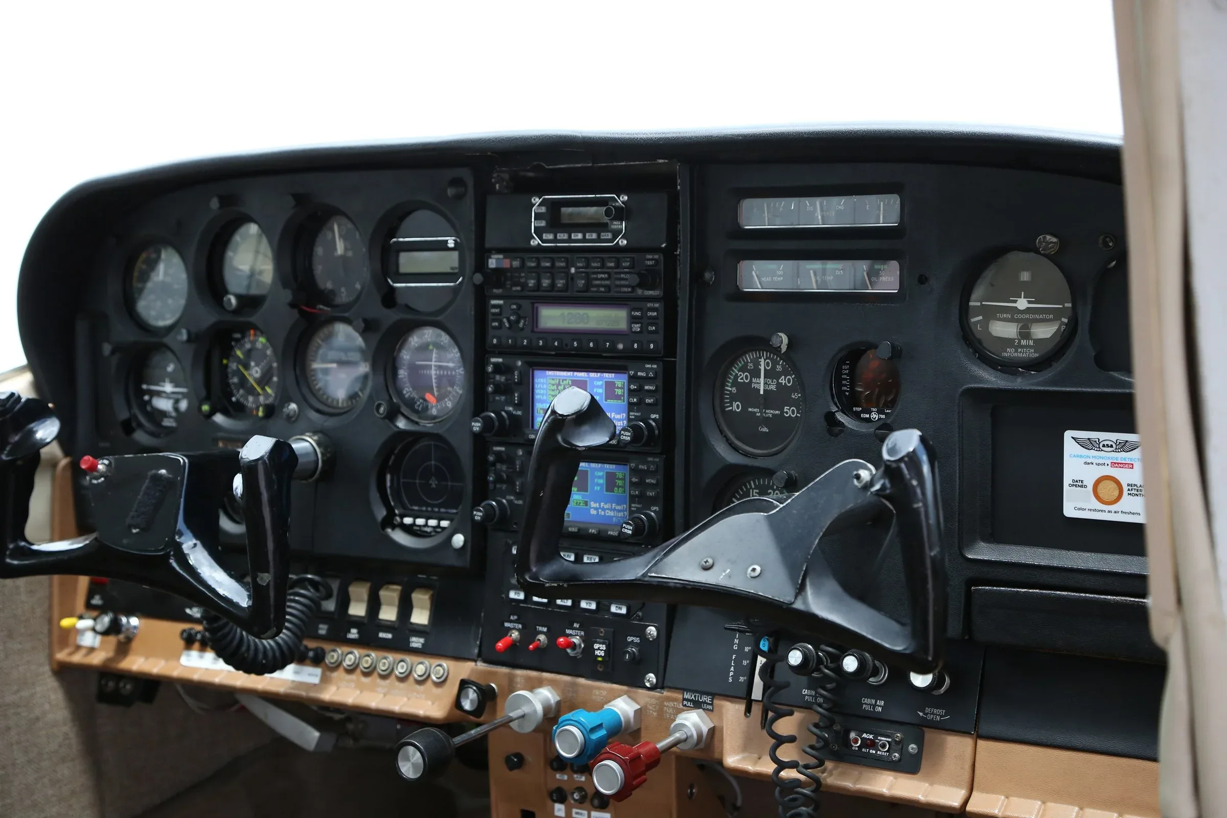 Cockpit and instrument panel of a 1969 Cessna 182 Skylane.