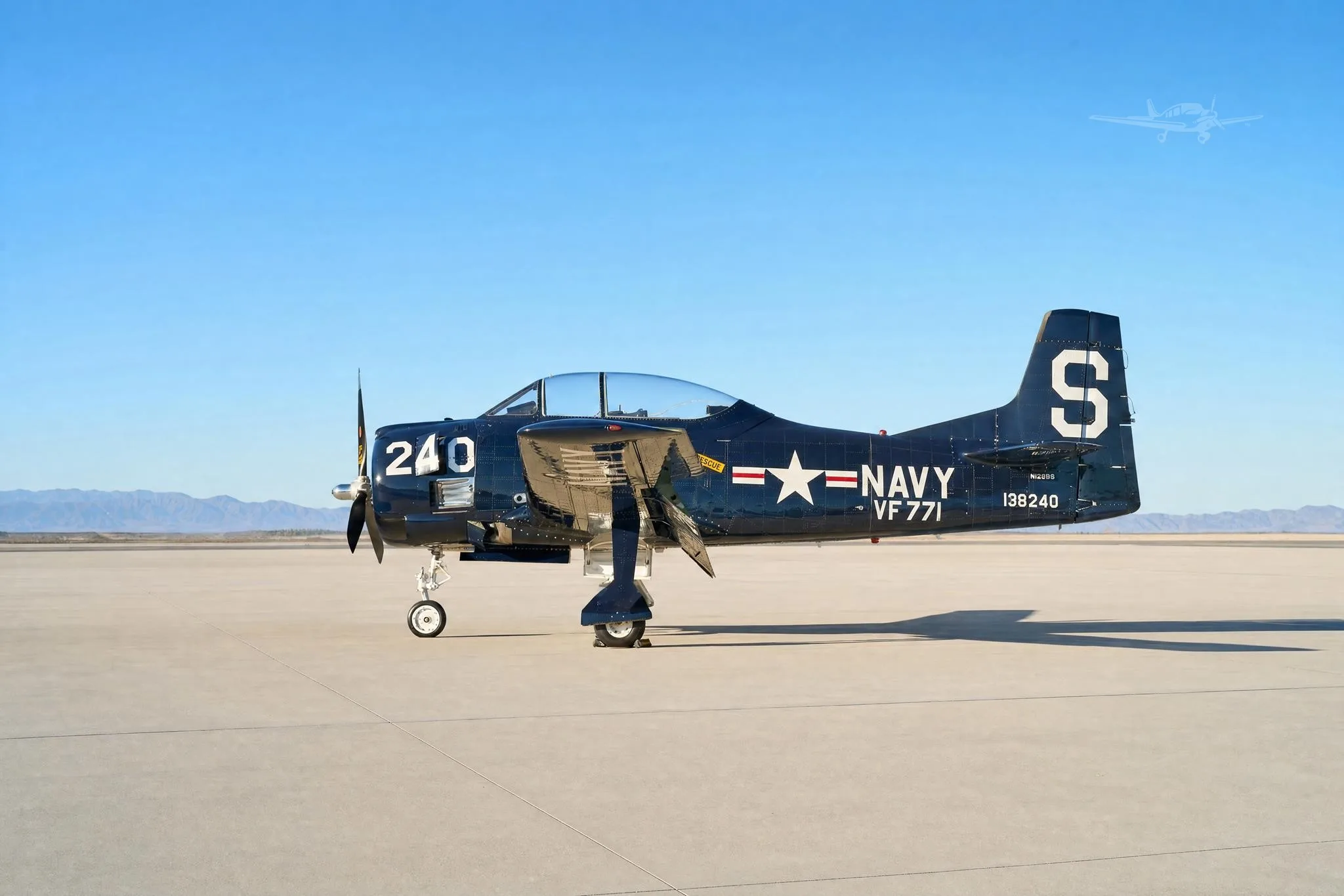 Exterior view of a 1955 NORTH AMERICAN T28B, N128BS.