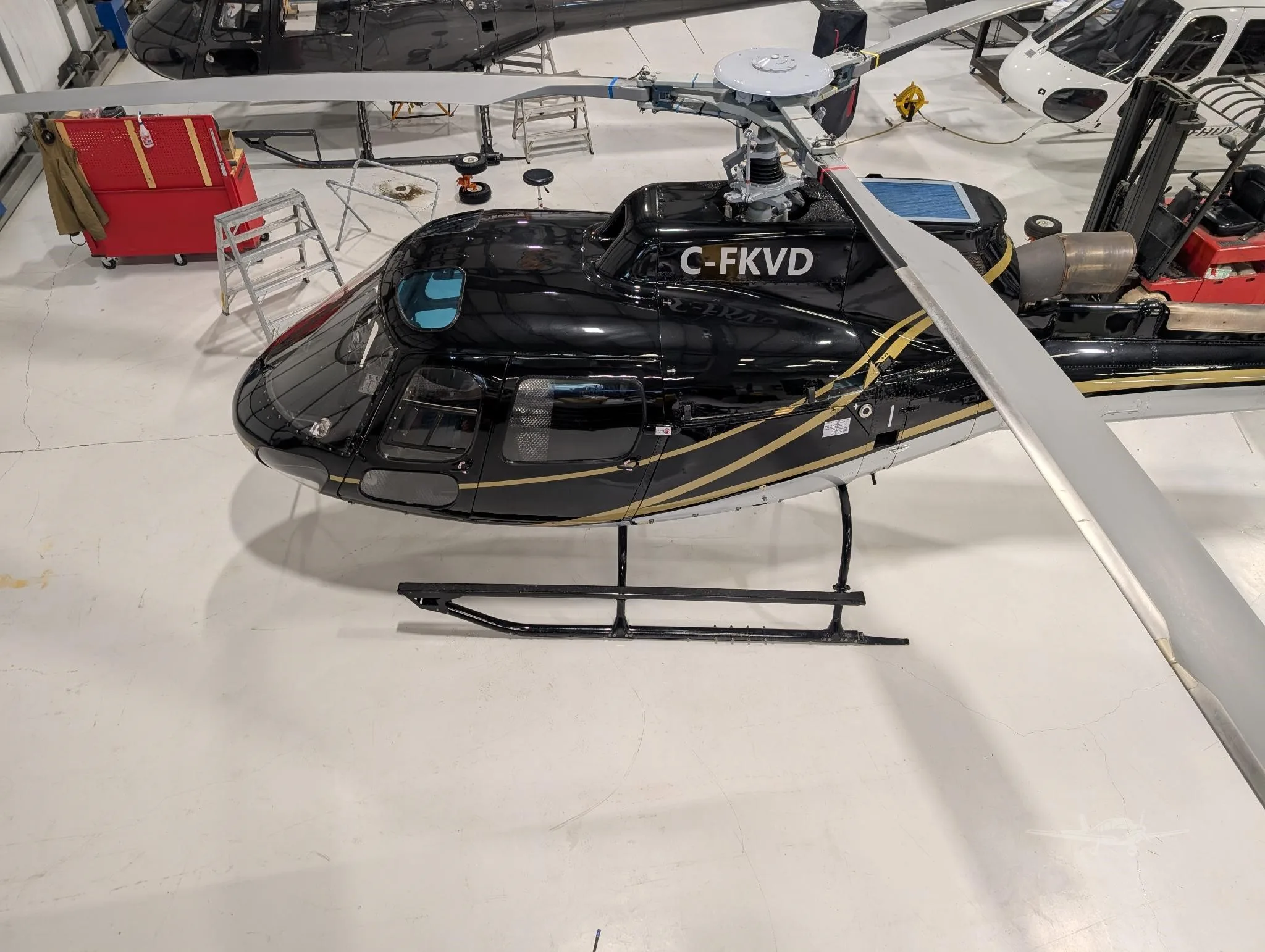 Exterior view of a 2003 EUROCOPTER AS350B-3, C-FKVD.