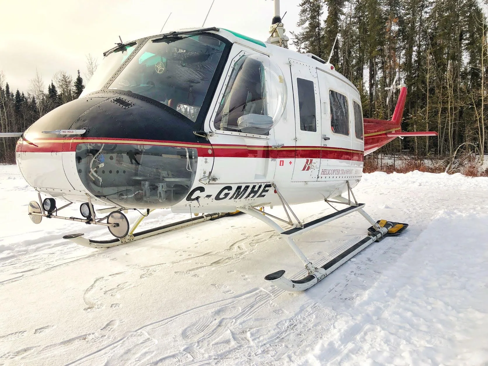 Exterior view of a 1975 Bell B205A1+ 30212, C-GMHE.