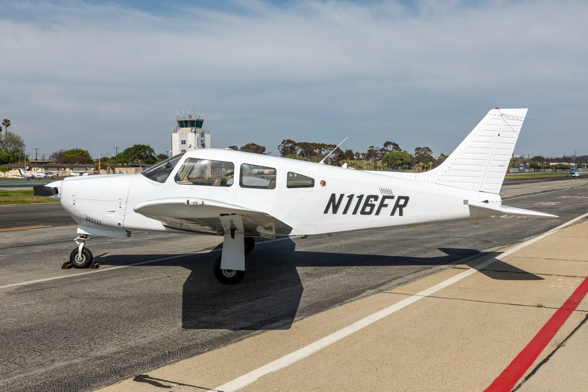 Exterior view of a 2014 Piper Arrow III, N116FR.
