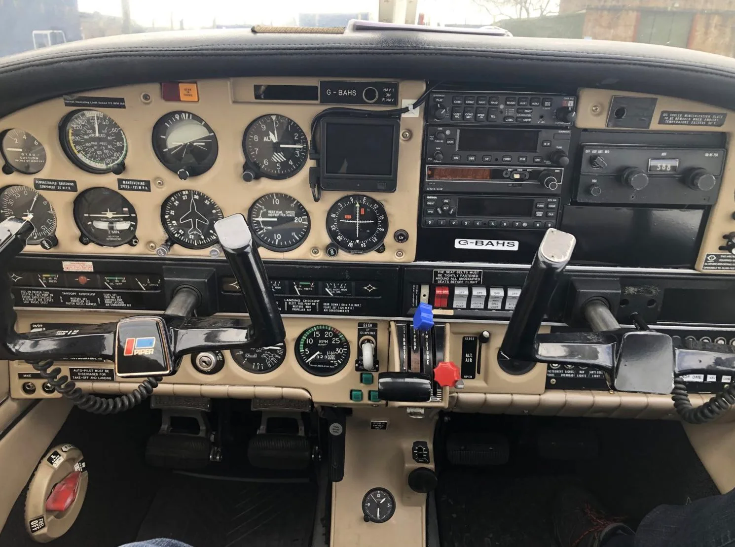 Cockpit and instrument panel of a 1972 Piper PA-28R-200 Arrow II.