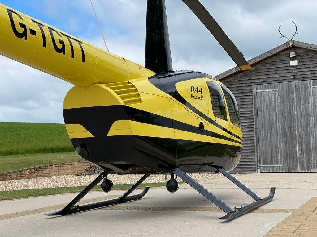 Marketing image of a 2002 Robinson R44 Raven II.