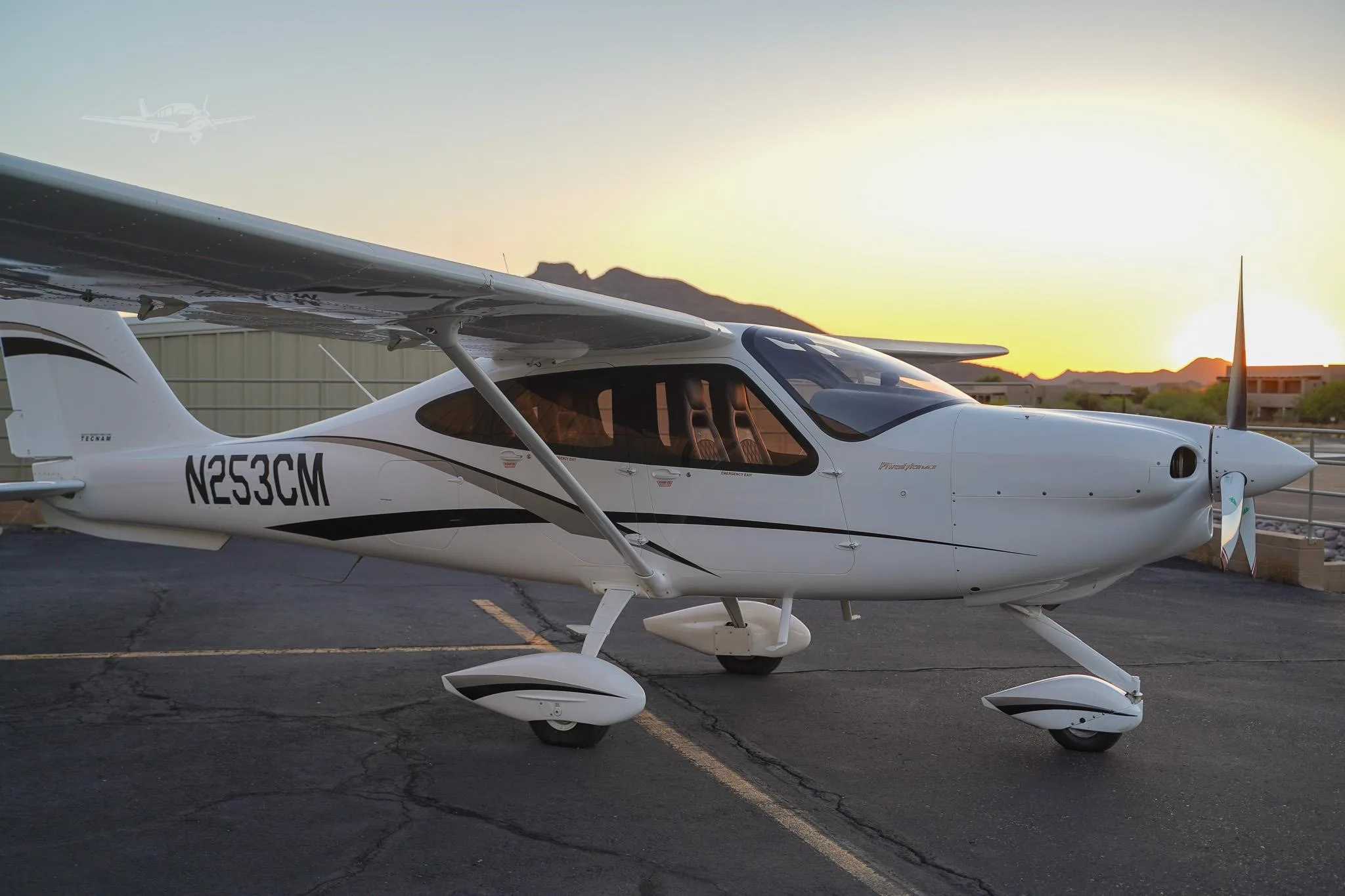 Exterior view of a 2021 TECNAM P2010 MKII, N253CM.