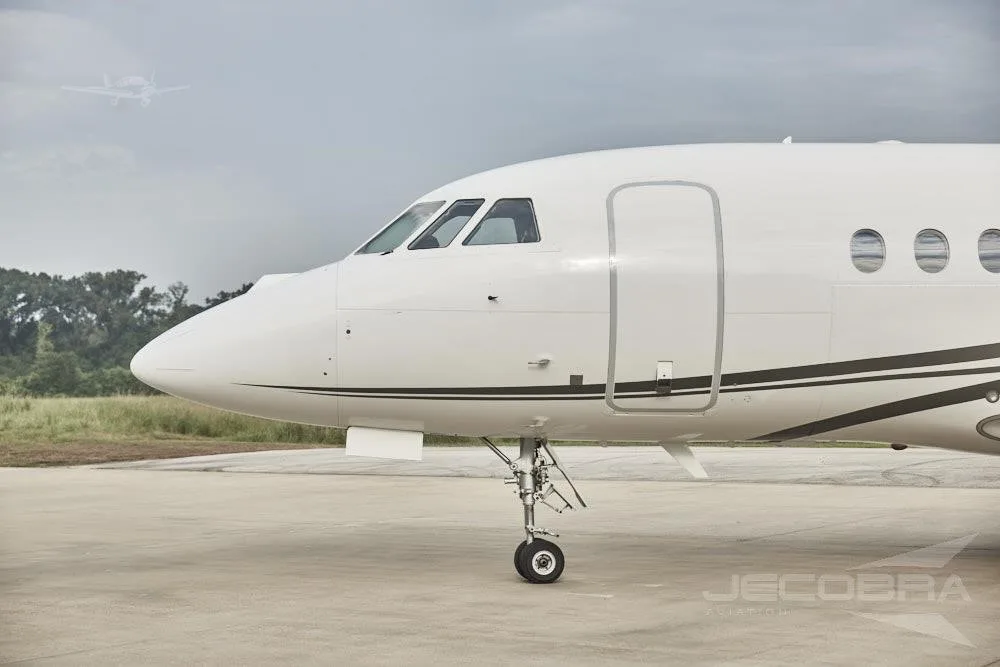 Exterior view of a 2006 DASSAULT FALCON 2000LX, N797PG.
