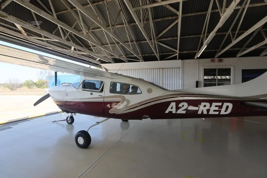 Exterior view of a 1975 CESSNA 210L, A2-RED.