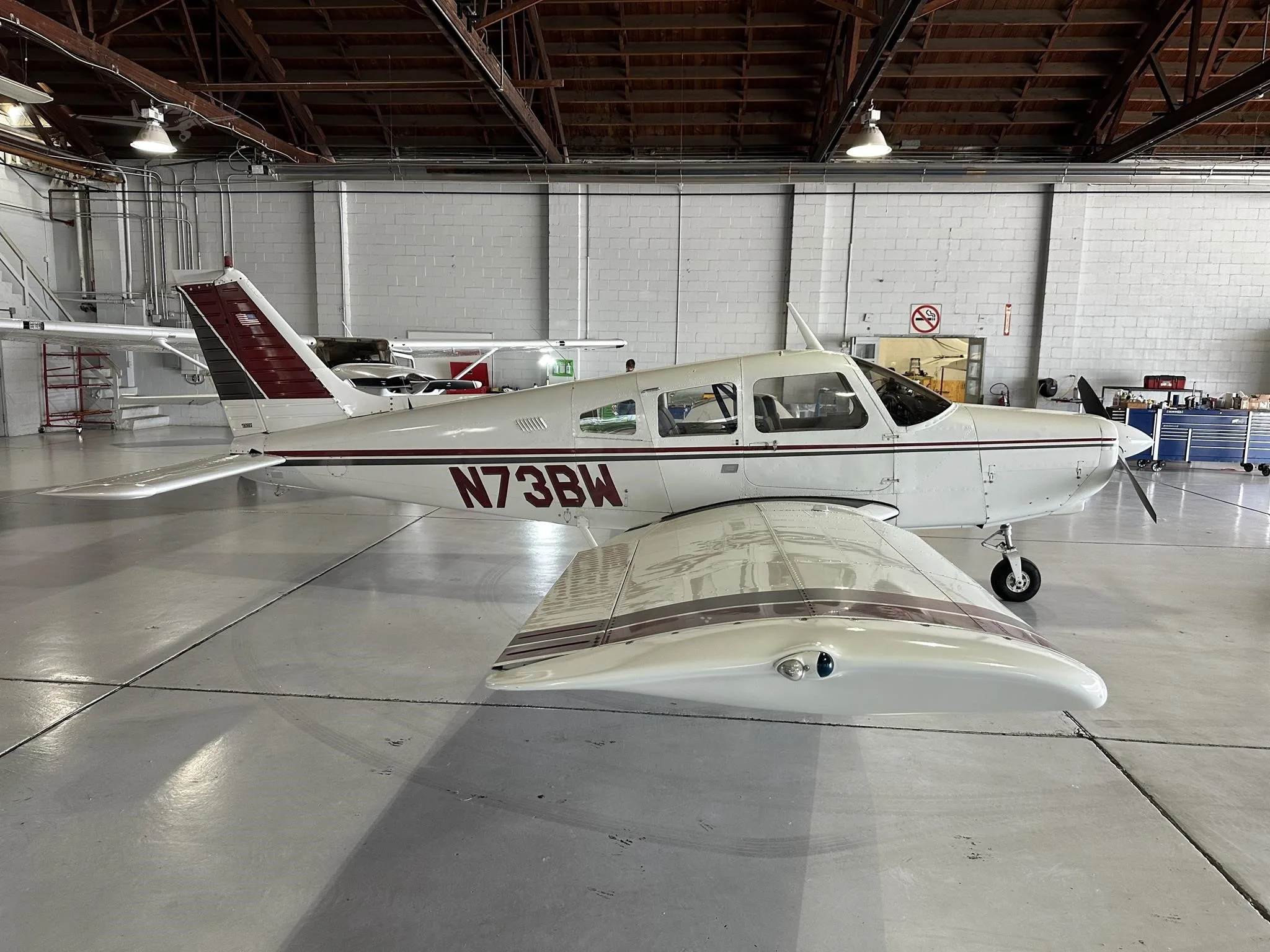 Exterior view of a 1978 PIPER WARRIOR II, N73BW.