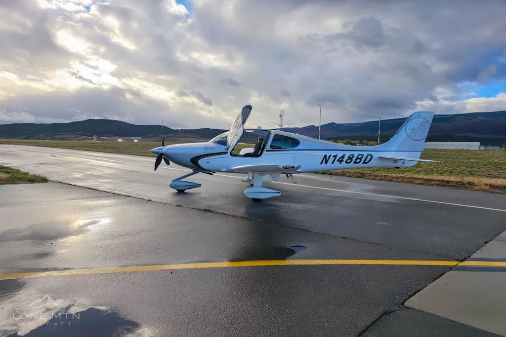 Exterior view of a 2012 Cirrus SR22T G3 GTS, N148BD.