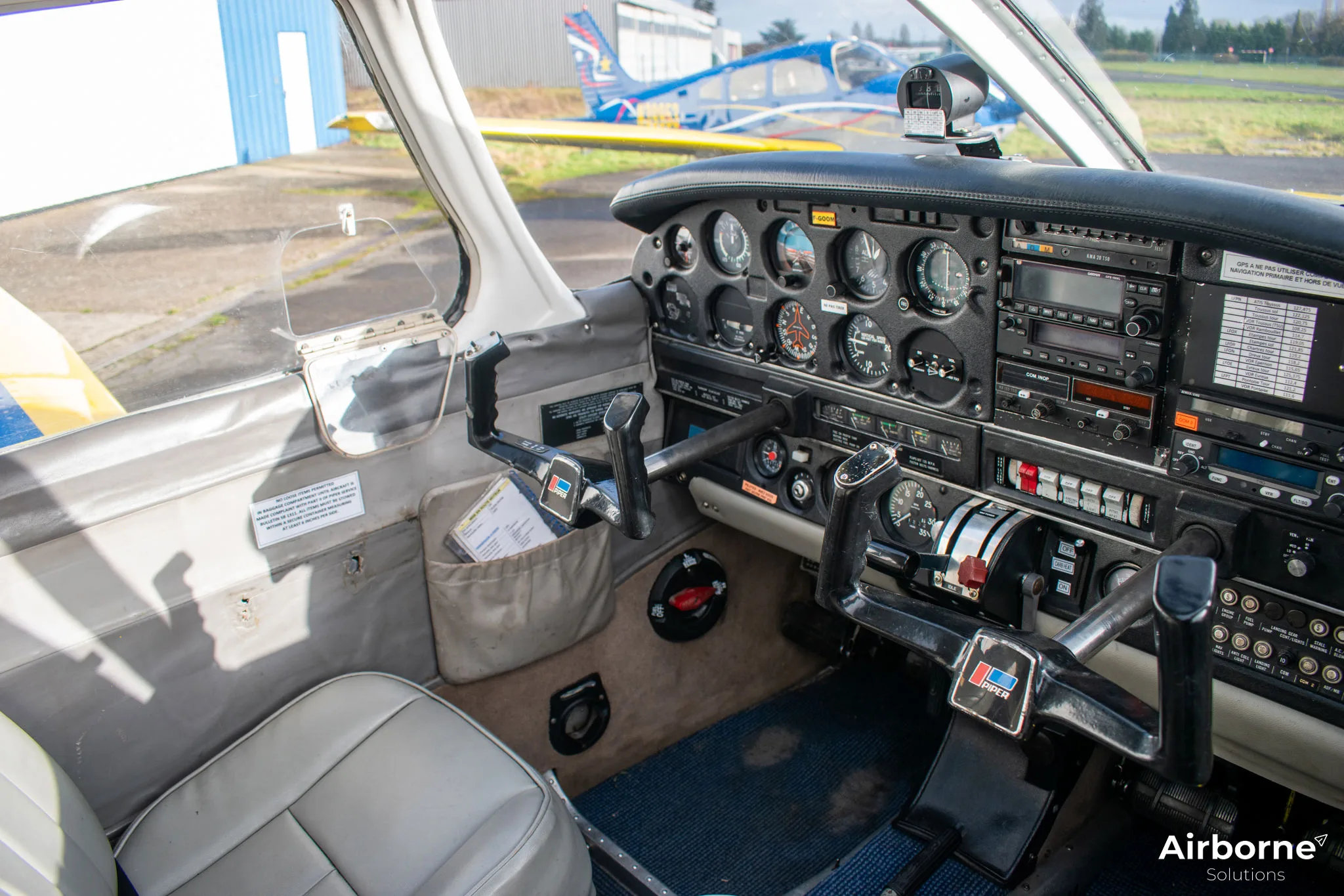 Cockpit and instrument panel of a 1975 Piper PA-28-151 Cherokee Warrior.