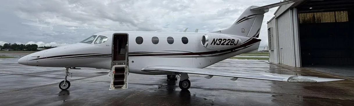 Exterior view of a 2004 BEECHCRAFT PREMIER I, N322BJ.