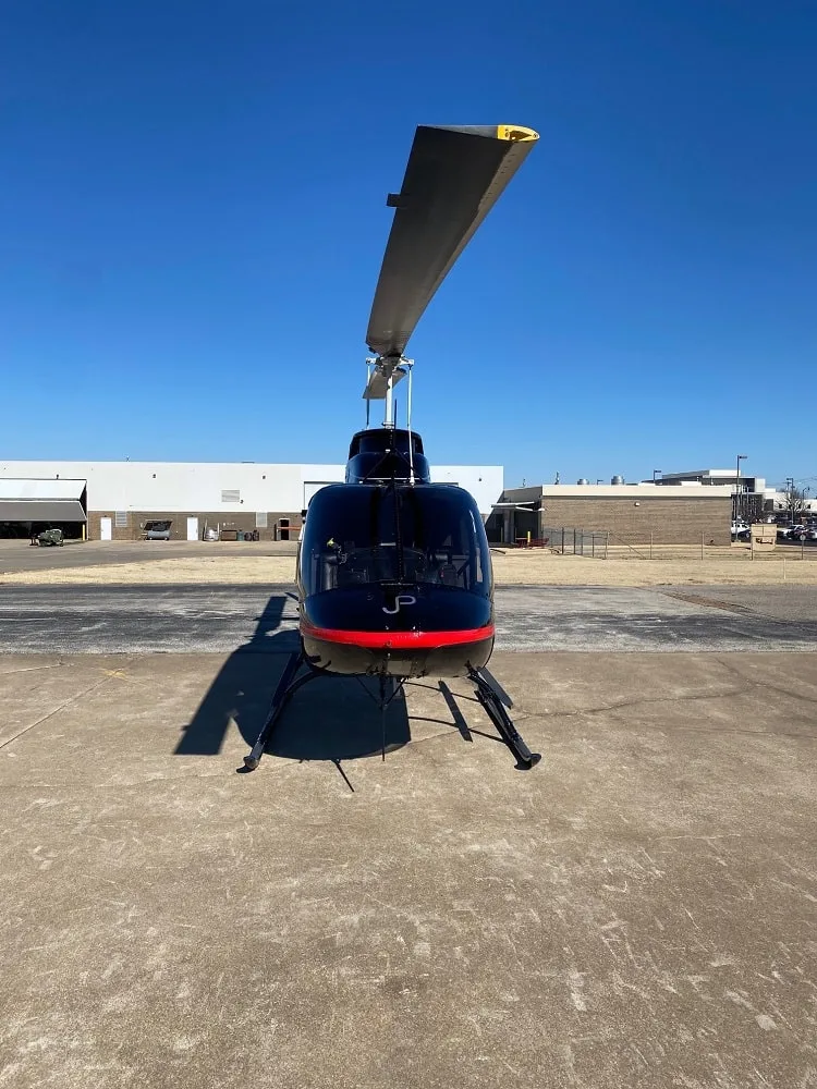 Exterior view of a 1974 Bell 206B-III, N235JP.