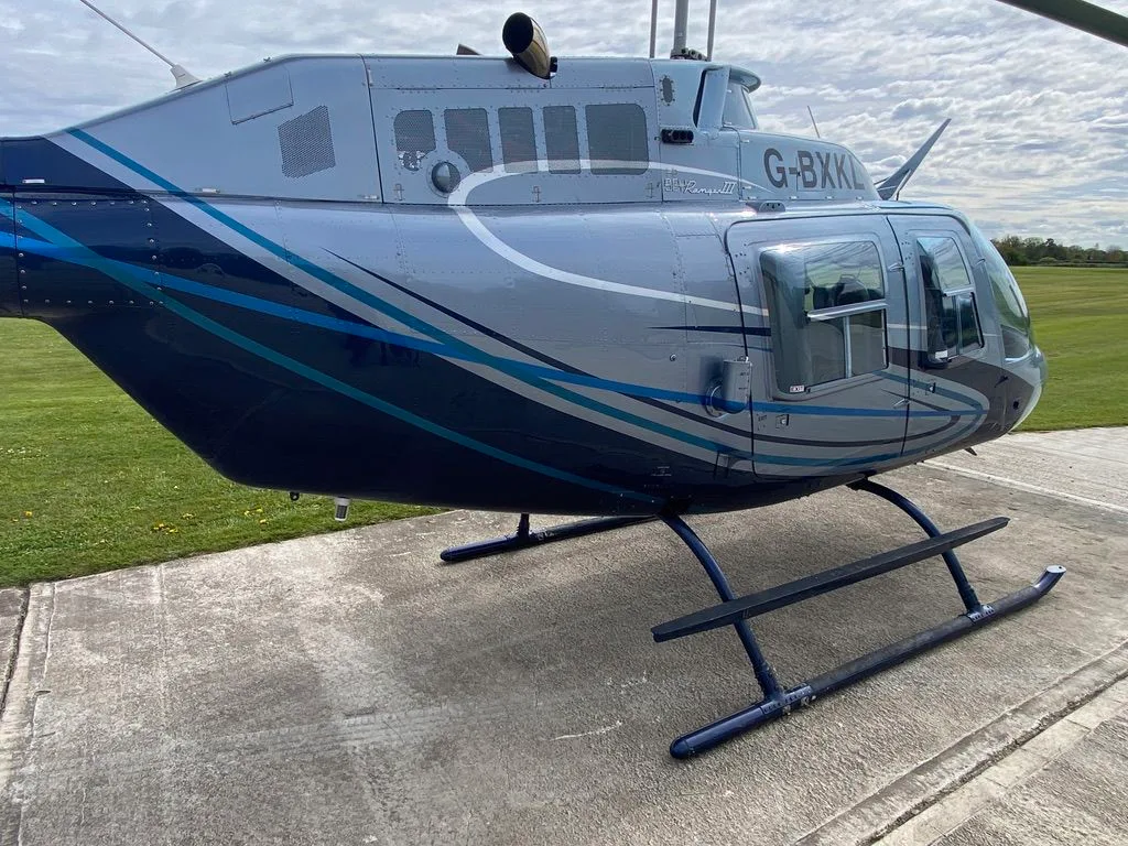 Exterior view of a 1980 Bell 206B-3 JetRanger, G-BXKL.