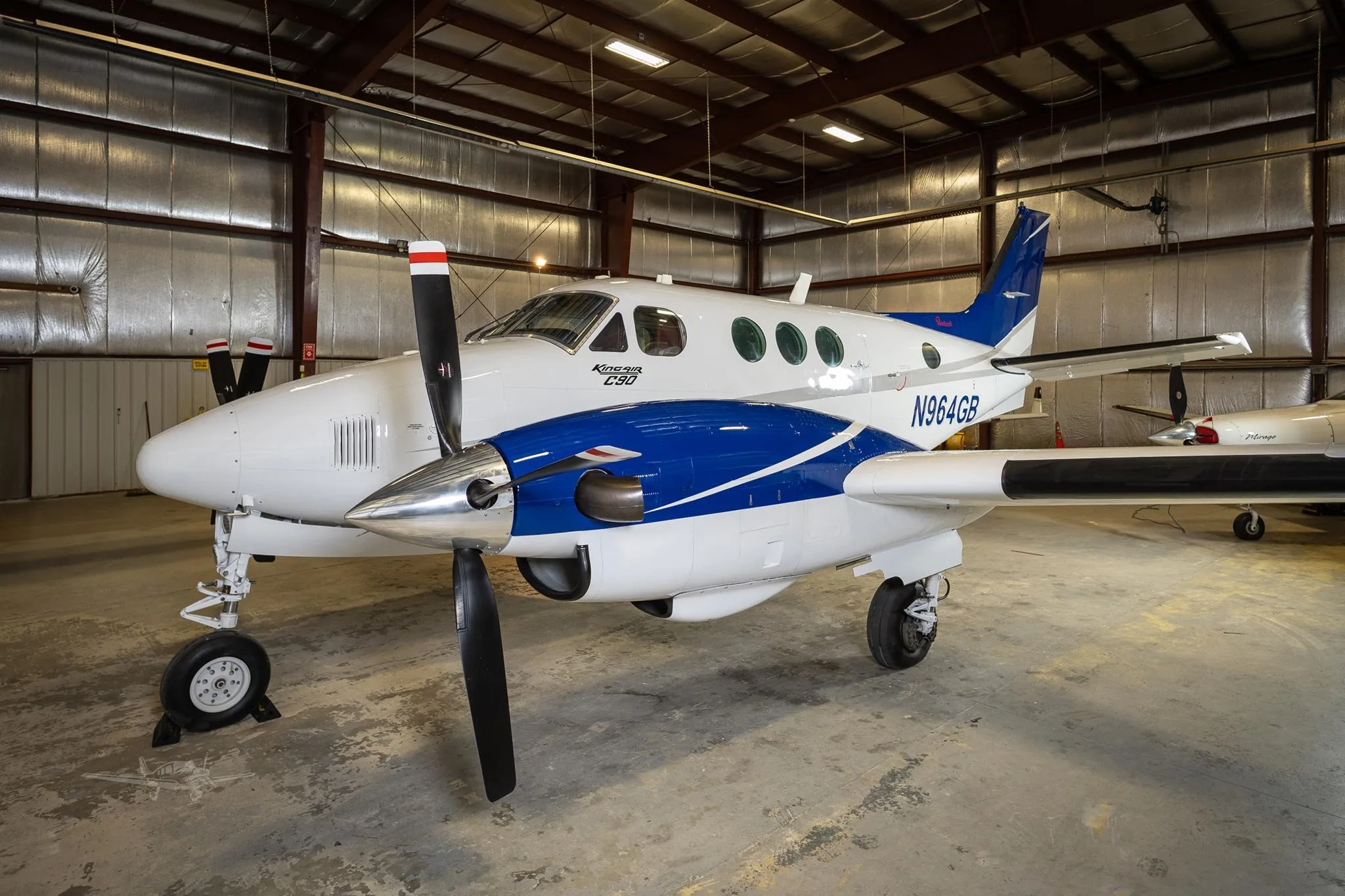 Exterior view of a 1982 BEECHCRAFT KING AIR C90, N964GB.