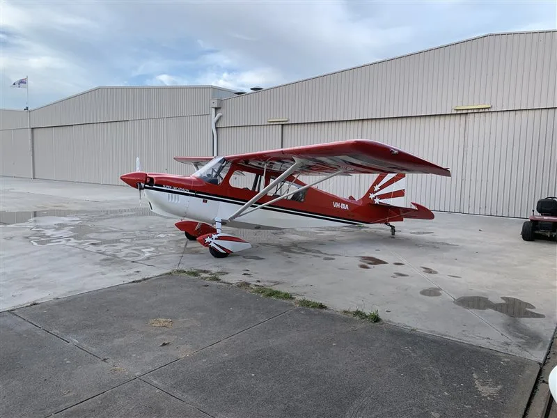 Exterior view of a 1979 American Champion 8KCAB, VH-BIA.