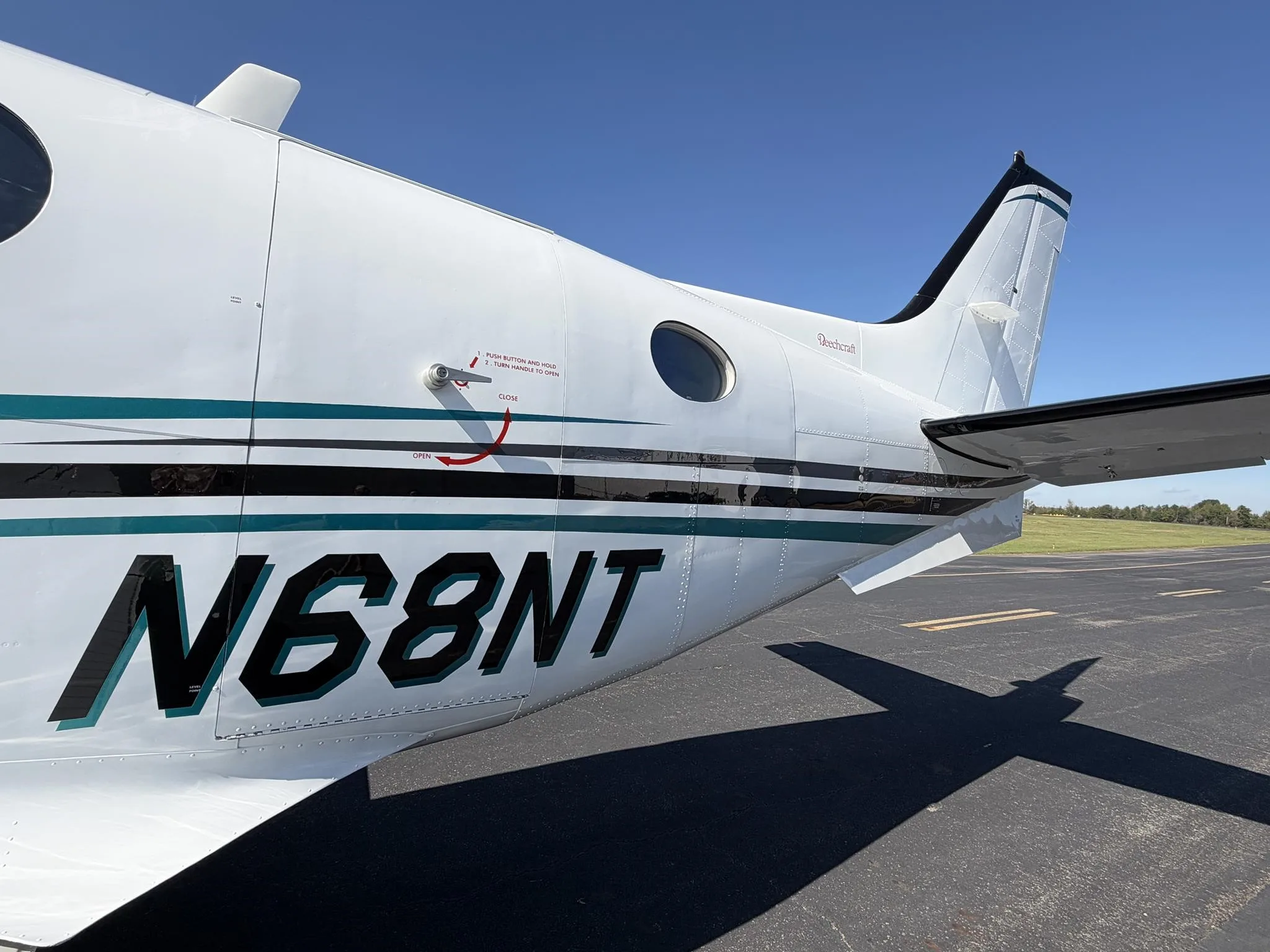Exterior view of a 2013 BEECHCRAFT KING AIR C90GTX, N68NT.