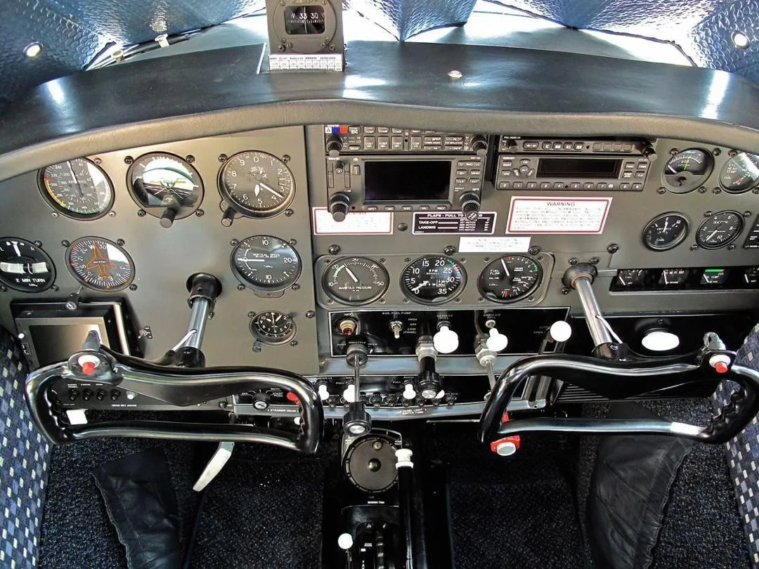Cockpit and instrument panel of a 1962 CESSNA 185.