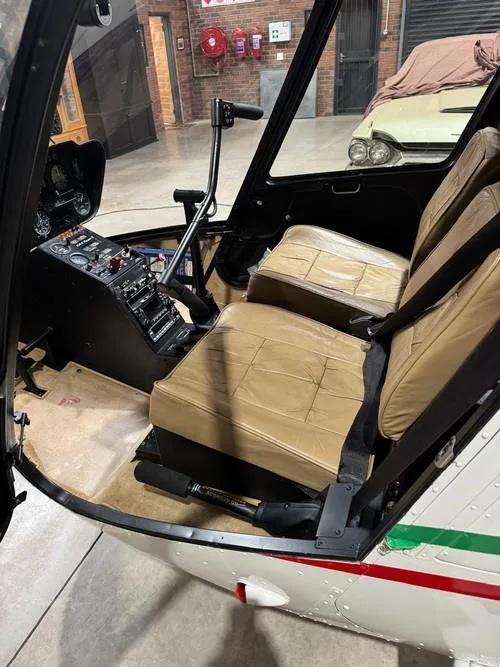 Cockpit and instrument panel of a 2008 ROBINSON R44 RAVEN II.