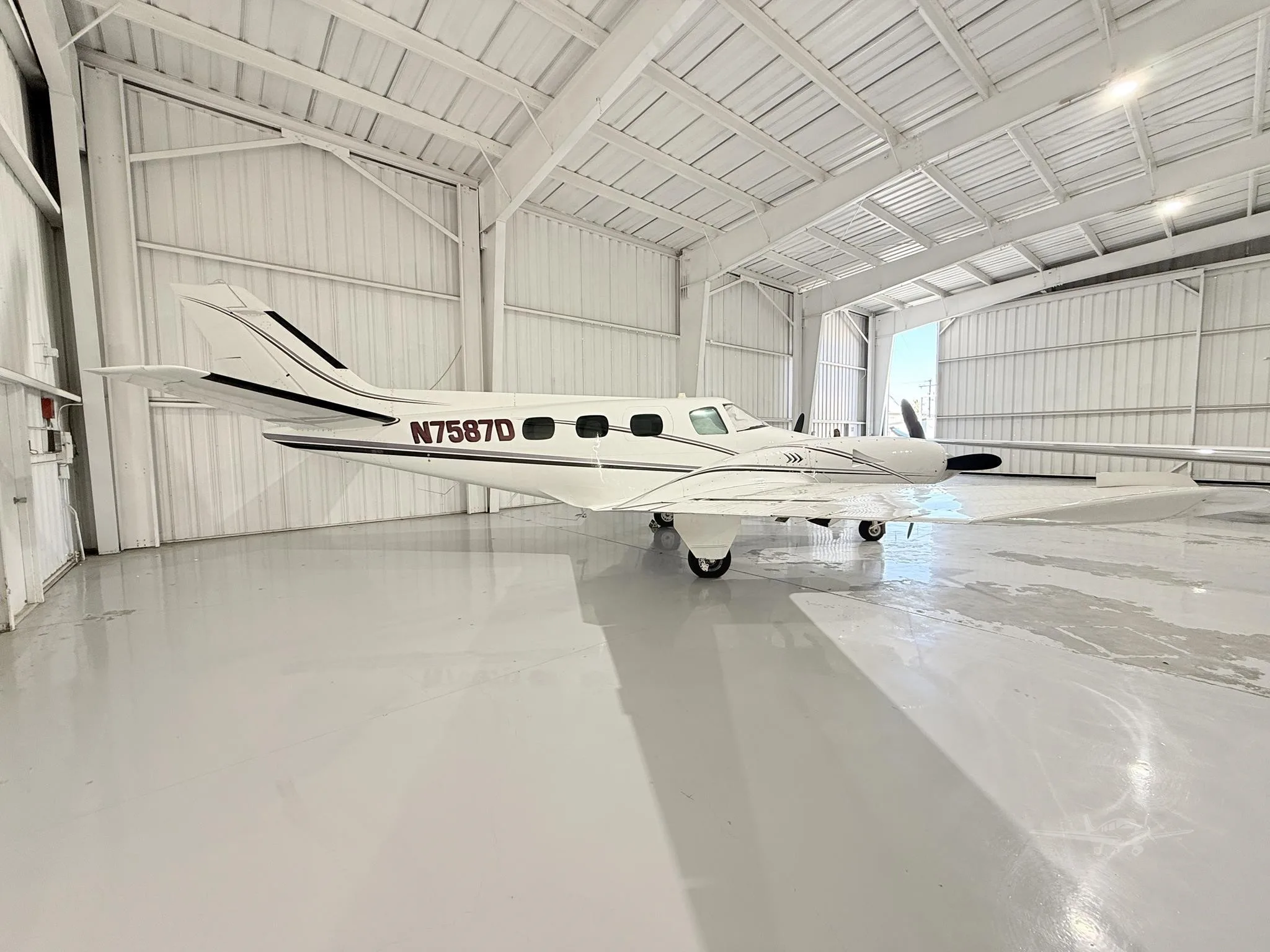 Exterior view of a 1971 BEECHCRAFT A60 DUKE, N7587D.
