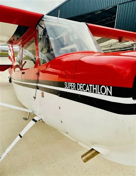 Exterior view of a 1979 American Champion 8KCAB, VH-BIA.