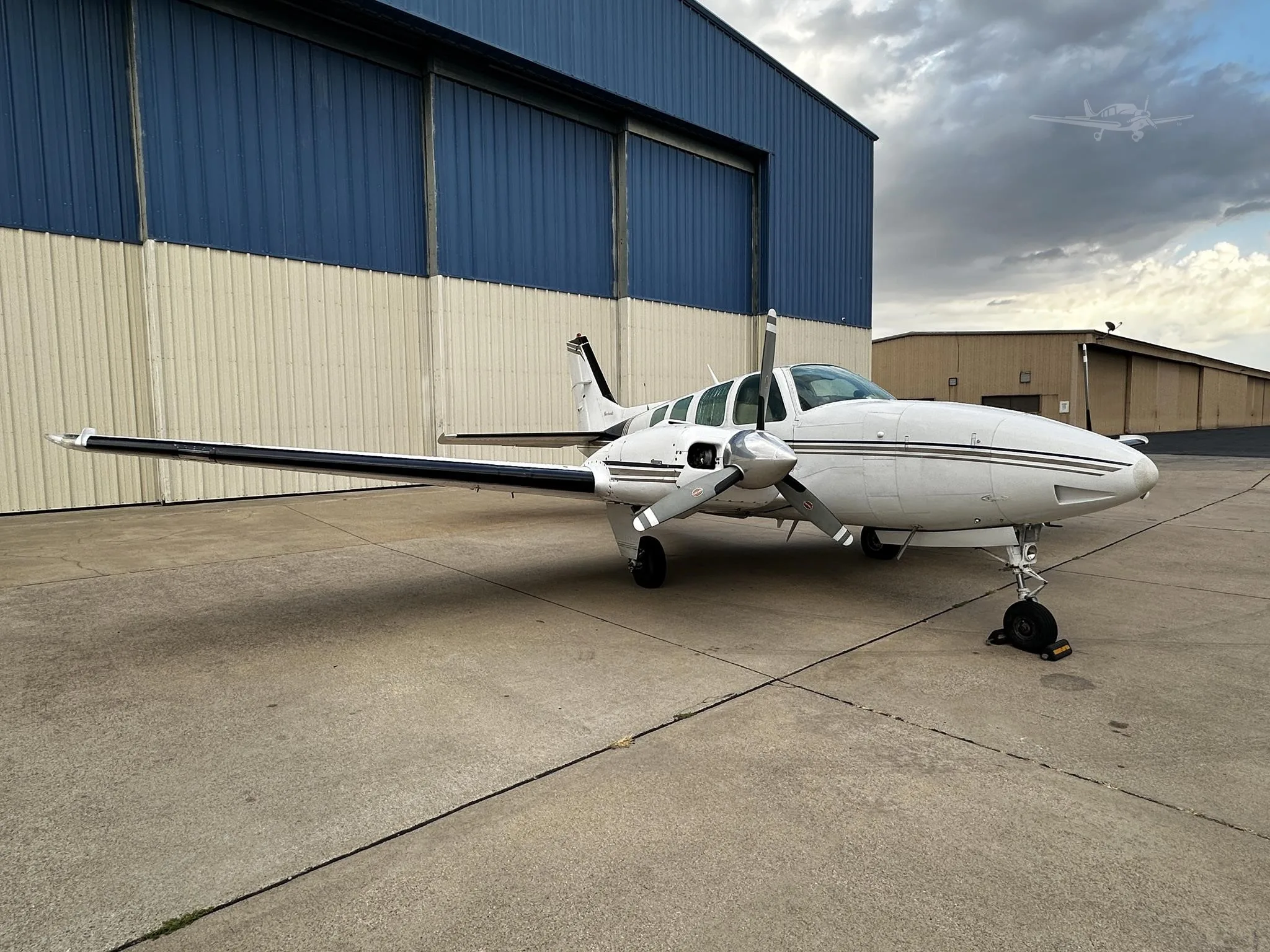 Exterior view of a 1976 BEECHCRAFT 58 BARON, N112PC.