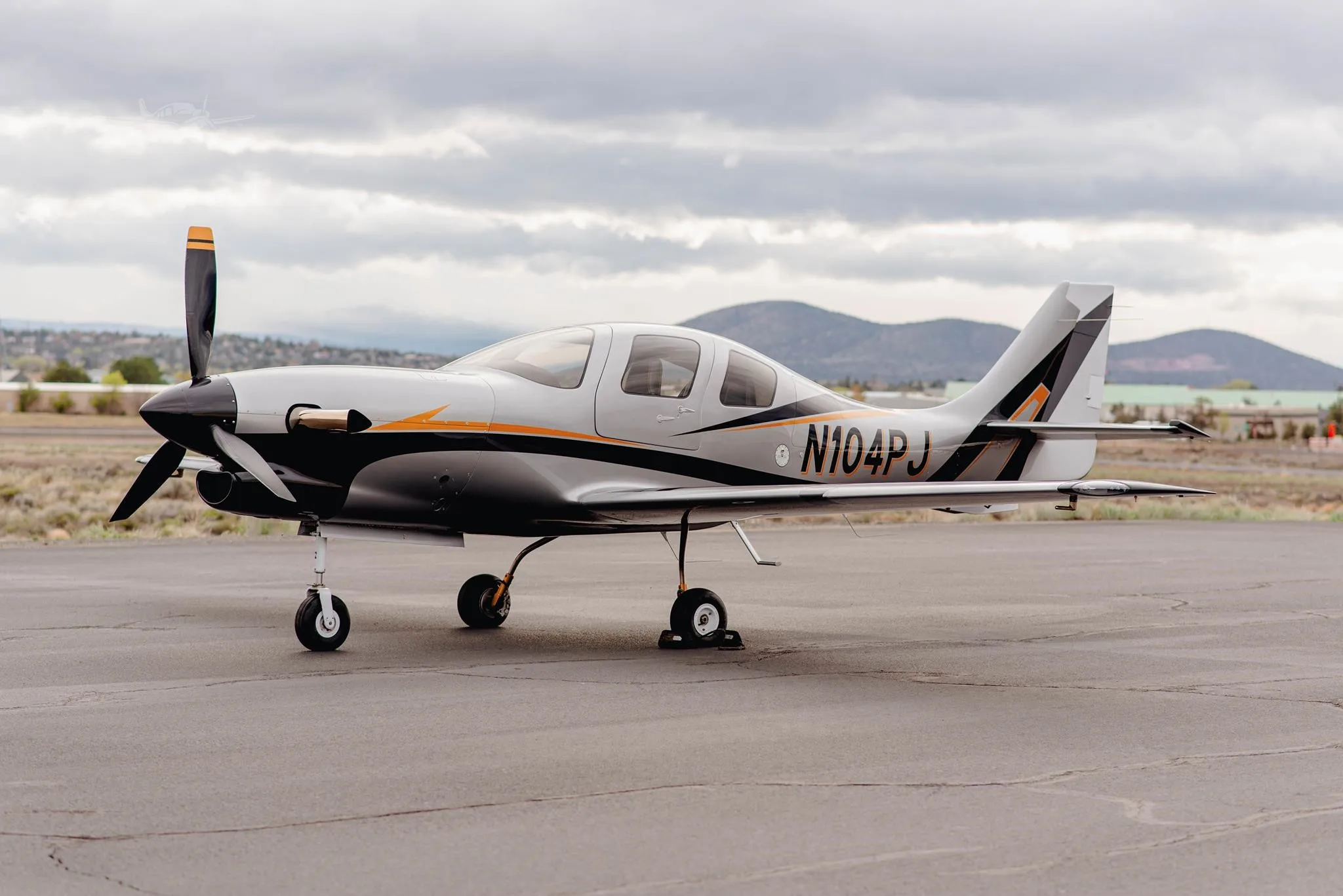 Exterior view of a 2003 LANCAIR IV-PT, N104PJ.