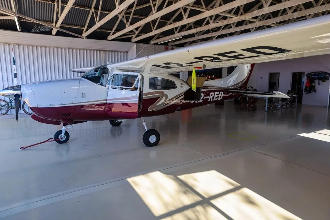 Exterior view of a 1975 CESSNA 210L, A2-RED.
