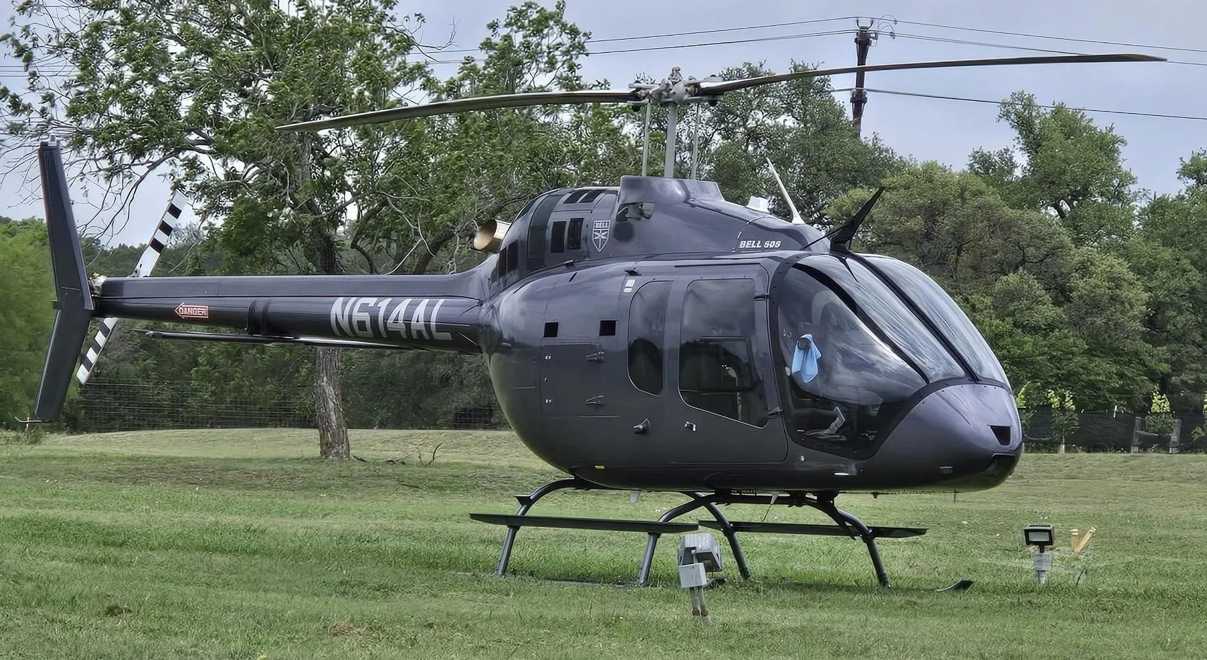 Exterior view of a 2025 BELL 505 JET RANGER X, N614AL.