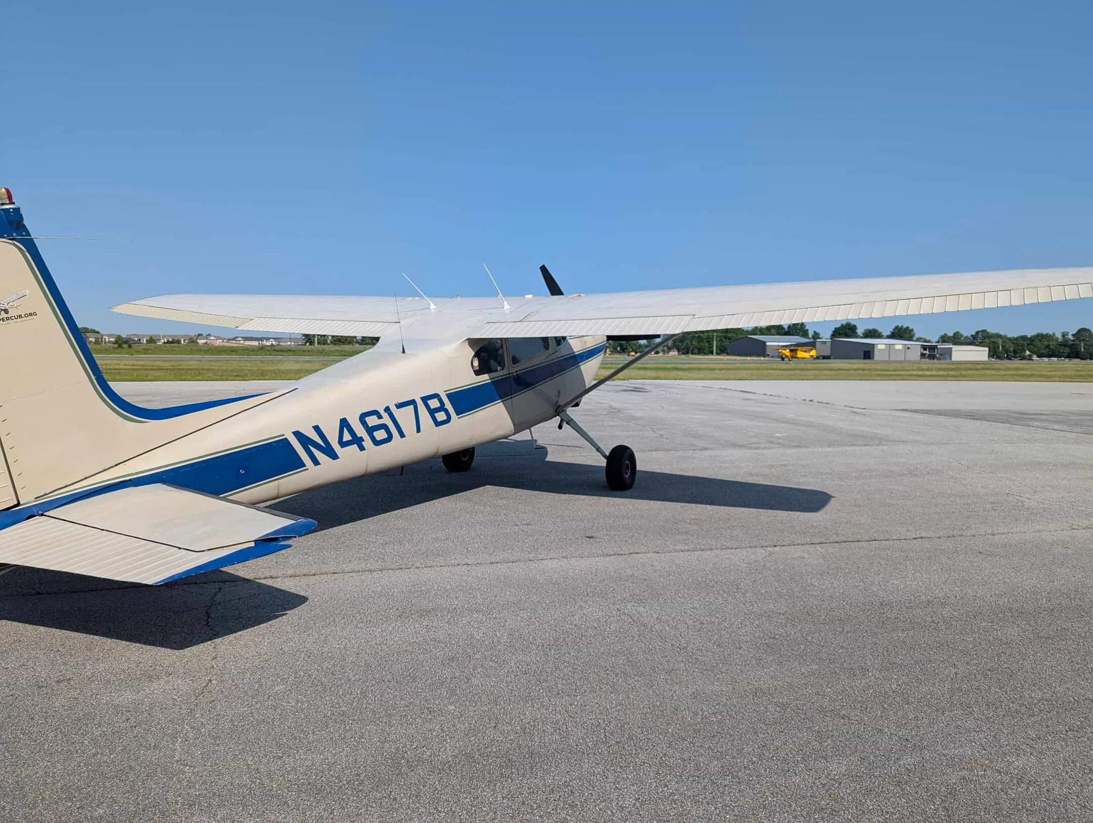 Marketing image of a 1955 Cessna 180.
