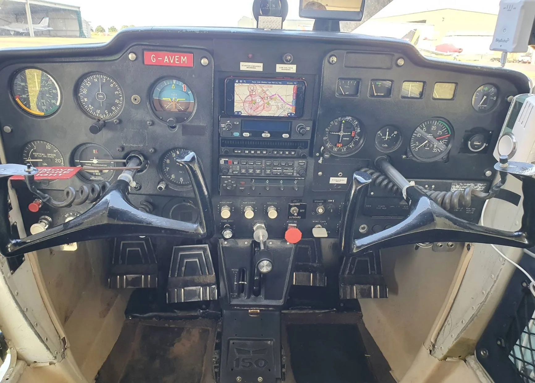 Cockpit and instrument panel of a 1967 Cessna 150G.