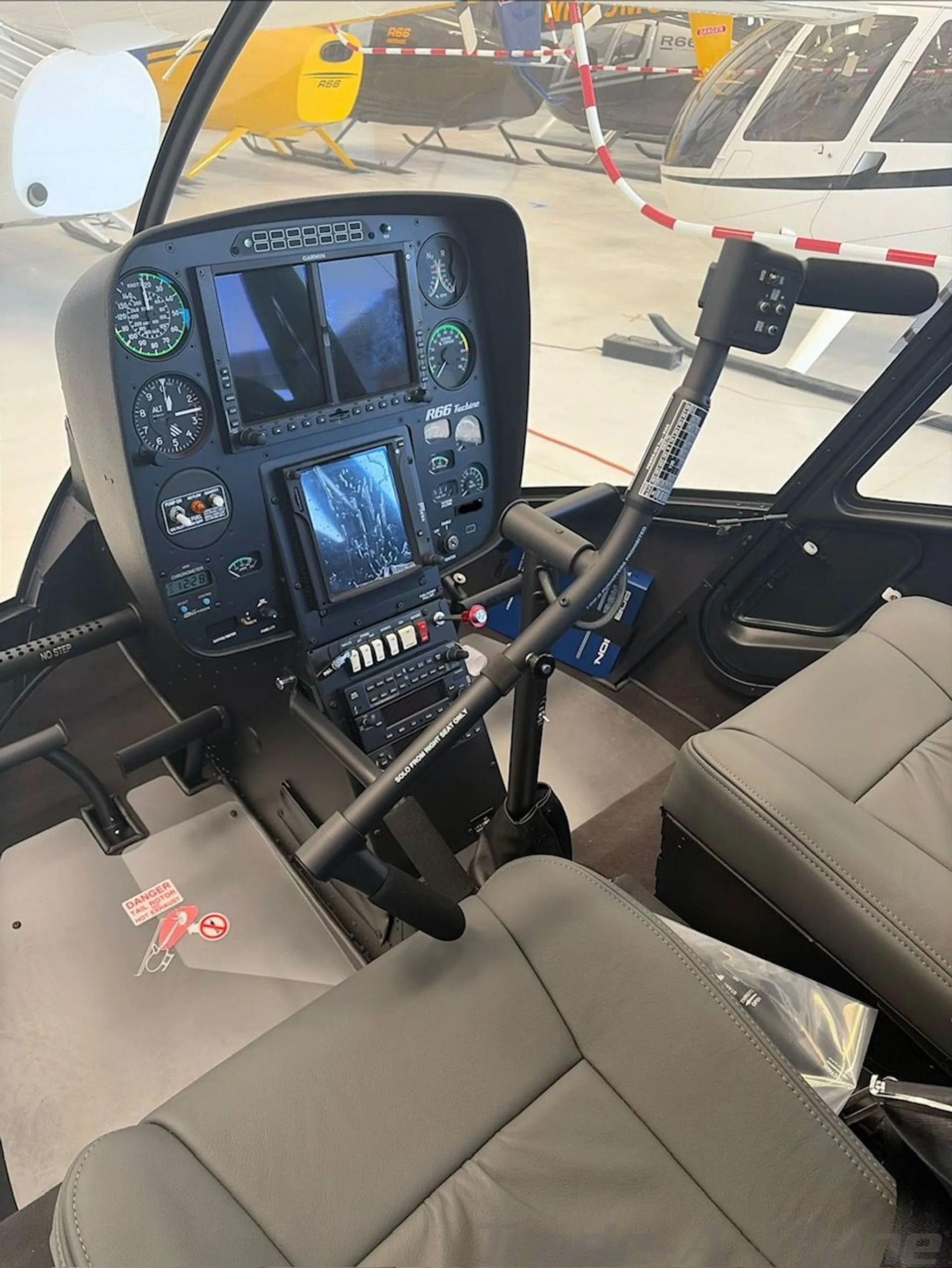 Cockpit and instrument panel of a 2016 ROBINSON R66 TURBINE MARINE.