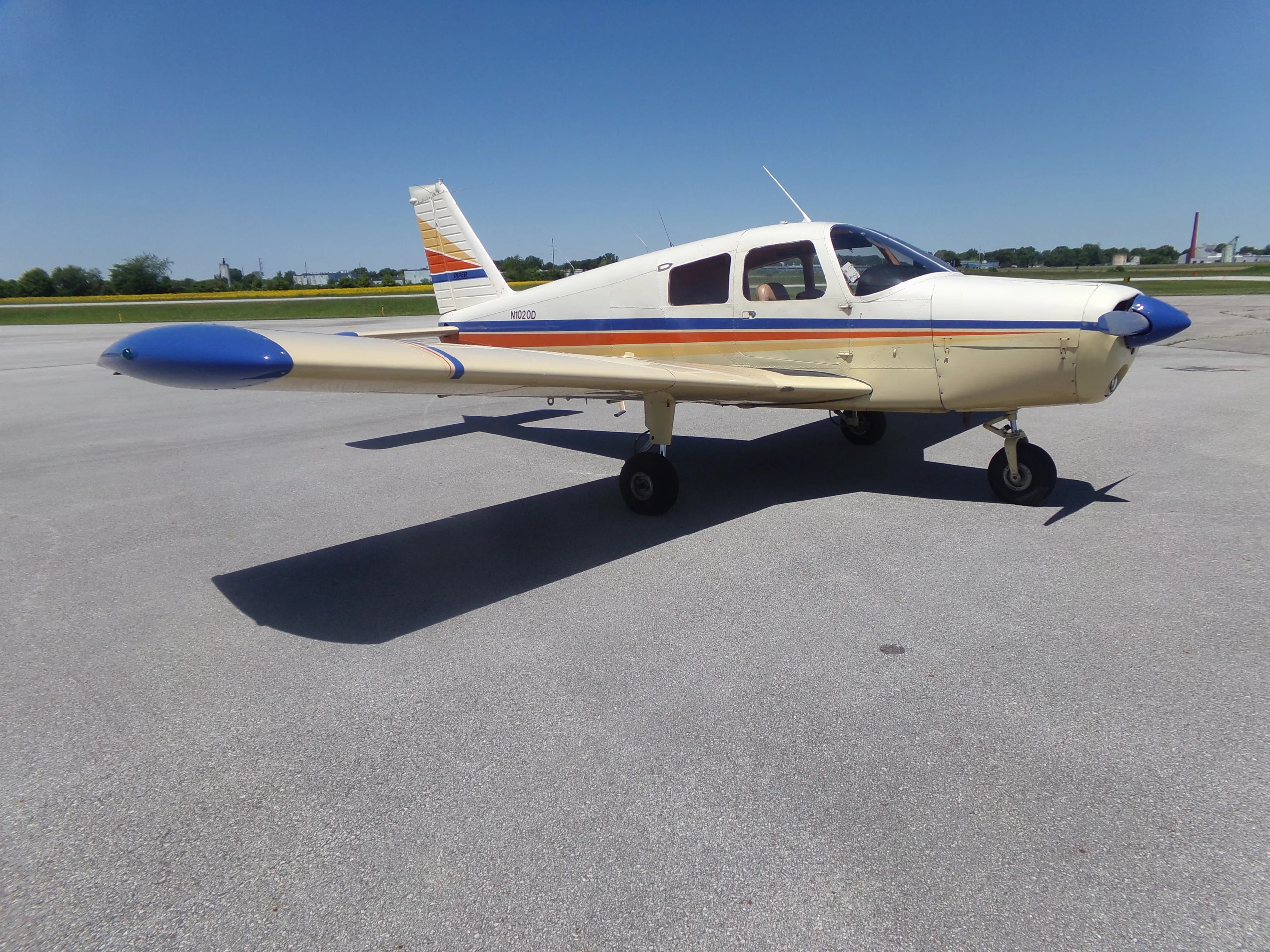 Exterior view of a 1974 Piper Cherokee 140, N1020D.