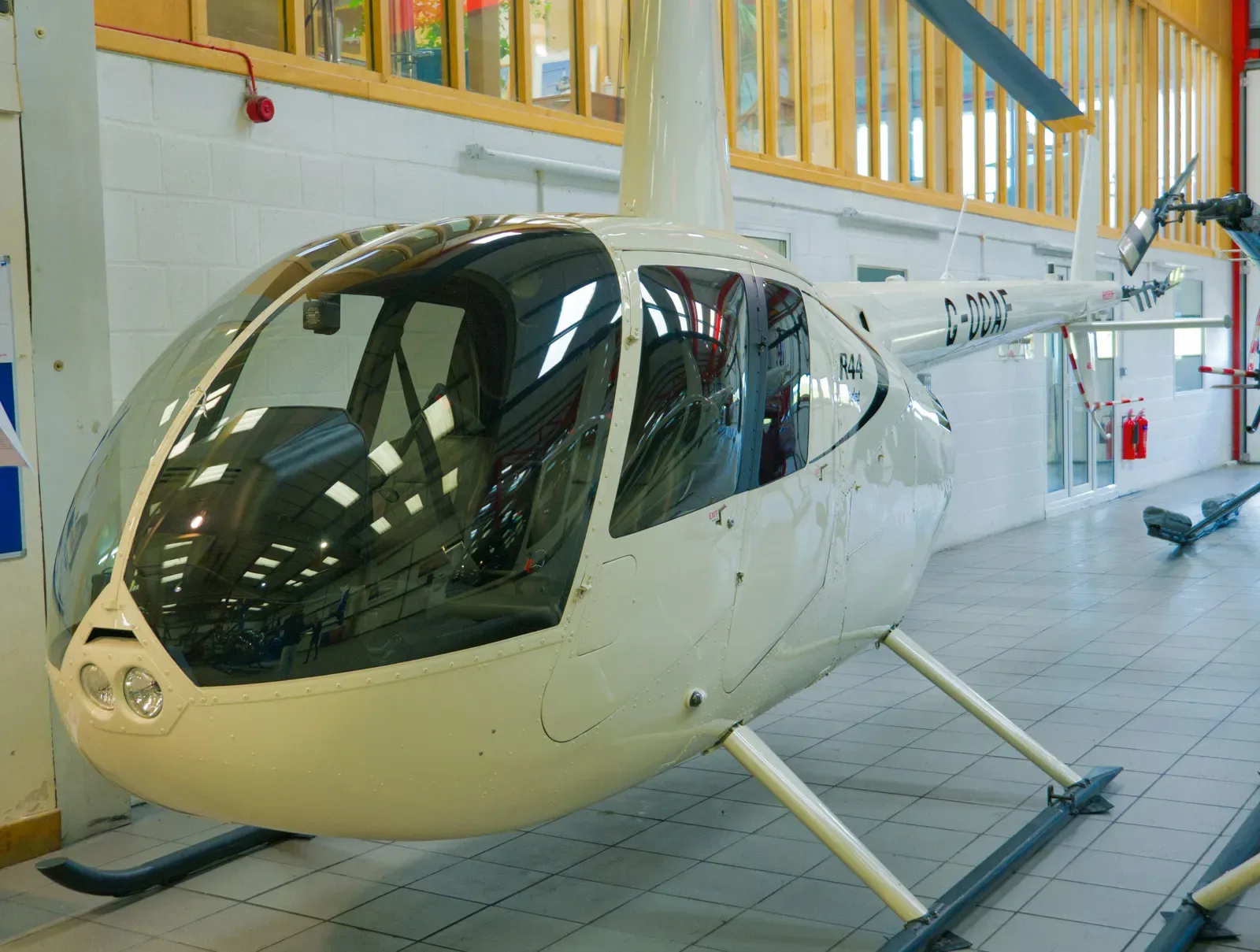 Exterior view of a 2018 Robinson R44 Cadet, G-OCAF.