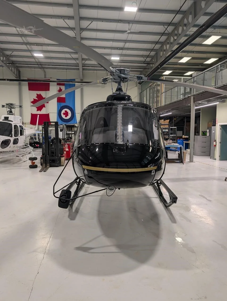 Exterior view of a 2003 EUROCOPTER AS350B-3, C-FKVD.